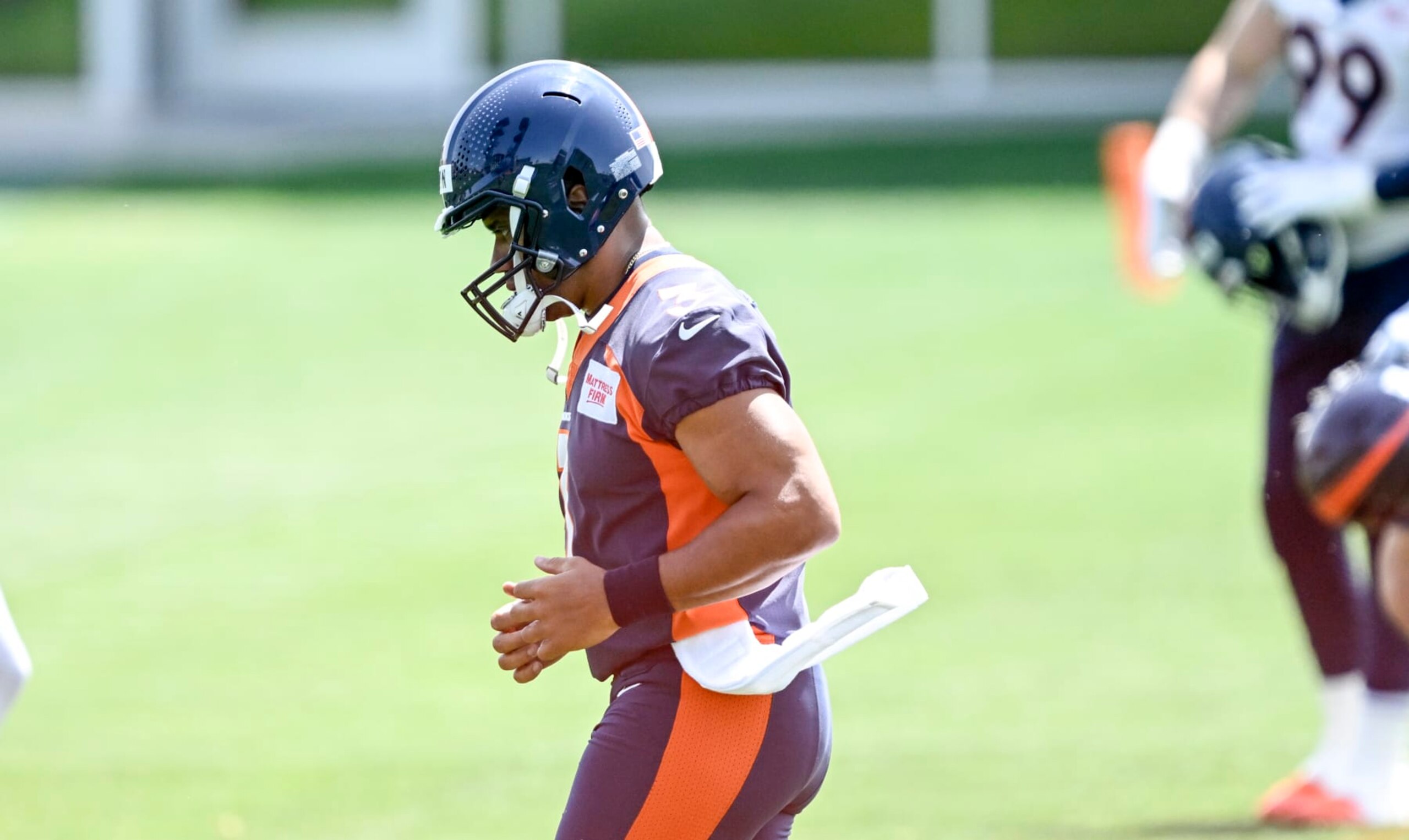 ENGLEWOOD , CO - JUNE 14: Russell Wilson (3) of the Denver Broncos jogs during minicamp at the team's training facility in Englewood, Colorado on Wednesday, June 14, 2023. (Photo by AAron Ontiveroz/The Denver Post)