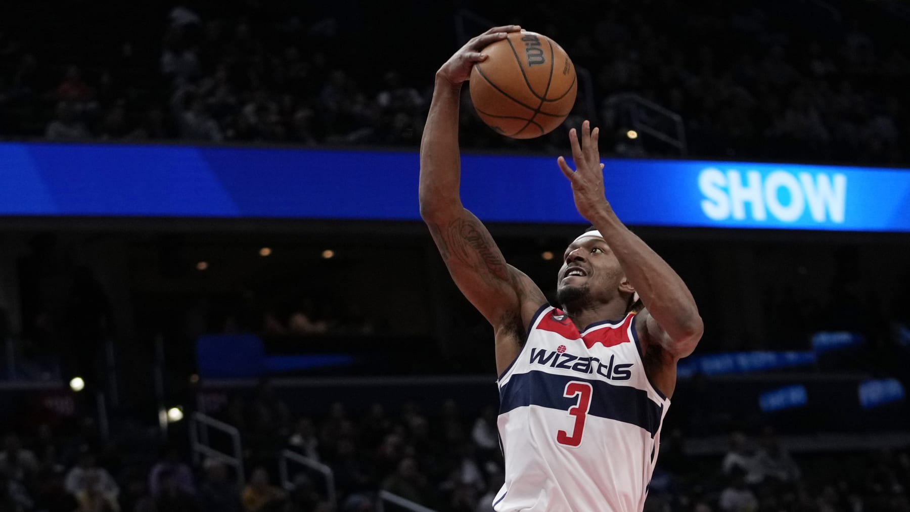 Washington Wizards guard Bradley Beal (3) shoot the ball during the first half of an NBA basketball game against the Detroit Pistons, Tuesday, March 14, 2023, in Washington. (AP Photo/Carolyn Kaster)