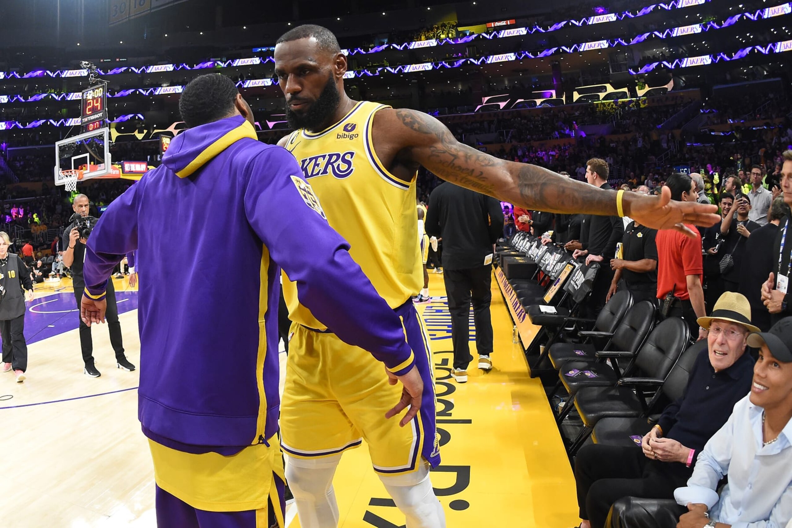 LOS ANGELES, CA - MAY 22: LeBron James #6 embraces Lonnie Walker IV #4 of the Los Angeles Lakers before round 2 game 4 of the Western Conference finals against the Denver Nuggets on May 22, 2023 at Crypto.Com Arena in Los Angeles, California. NOTE TO USER: User expressly acknowledges and agrees that, by downloading and/or using this Photograph, user is consenting to the terms and conditions of the Getty Images License Agreement. Mandatory Copyright Notice: Copyright 2023 NBAE (Photo by Andrew D. Bernstein/NBAE via Getty Images)