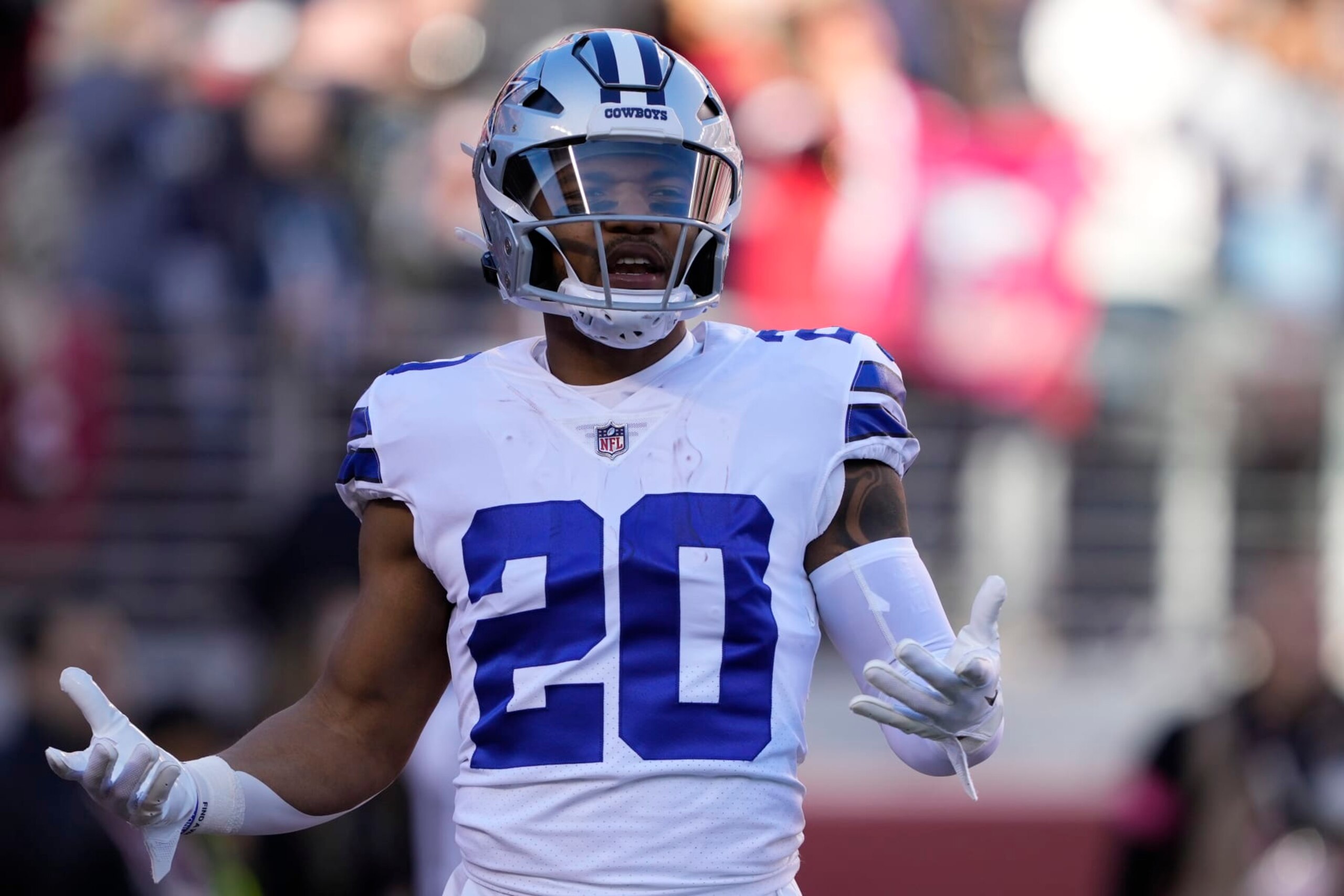 Dallas Cowboys running back Tony Pollard (20) warms up before an NFL divisional round playoff football game against the San Francisco 49ers in Santa Clara, Calif., Sunday, Jan. 22, 2023. (AP Photo/Tony Avelar) Dallas Cowboys running back Tony Pollard (20) warms up before an NFL divisional round playoff football game against the San Francisco 49ers in Santa Clara, Calif., Sunday, Jan. 22, 2023. (AP Photo/Tony Avelar)