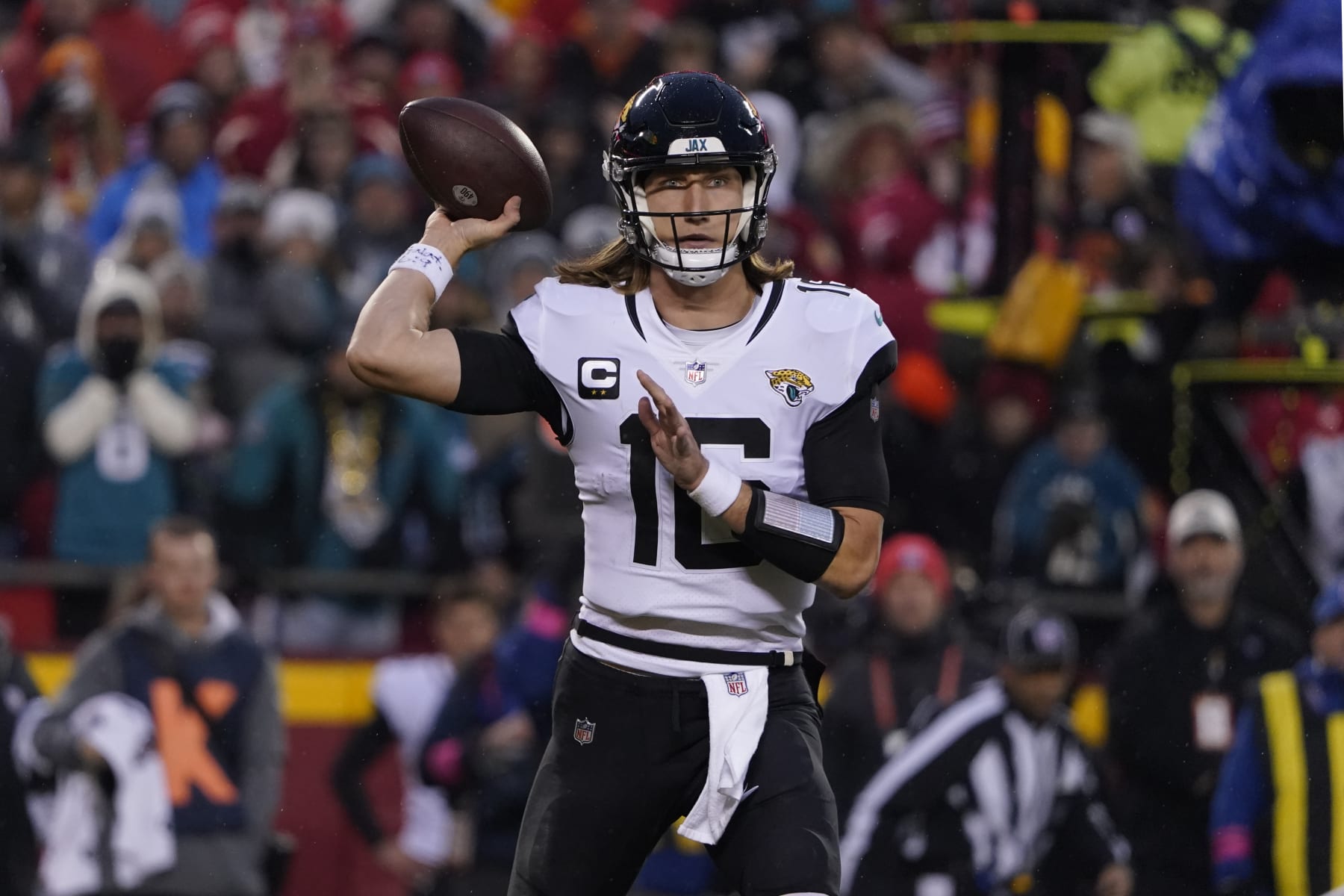 Jacksonville Jaguars quarterback Trevor Lawrence passes against the Kansas City Chiefs during an NFL Divisional Playoff football game Saturday, Jan. 21, 2023, in Kansas City, Mo. (AP Photo/Ed Zurga)