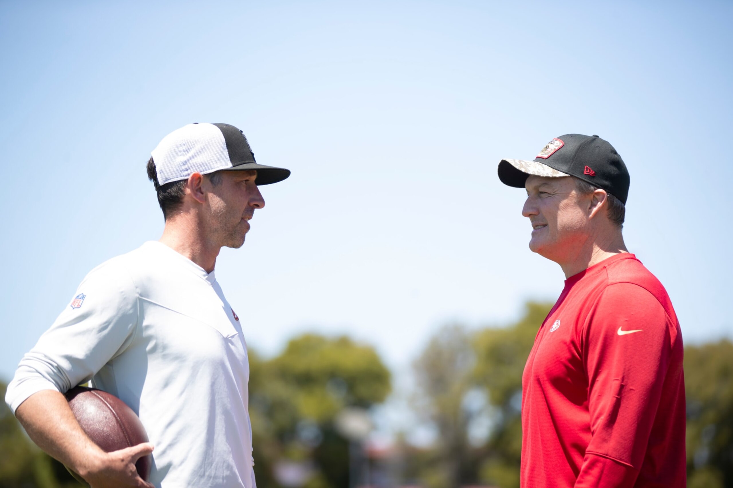 SANTA CLARA, CA - MAY 12: Head Coach Kyle Shanahan and General Manager John Lynch of the San Francisco 49ers during rookie training camp at the SAP Performance Facility on May 12, 2023 in Santa Clara, California.  (Photo by Michael Zagaris/San Francisco 49ers/Getty Images)