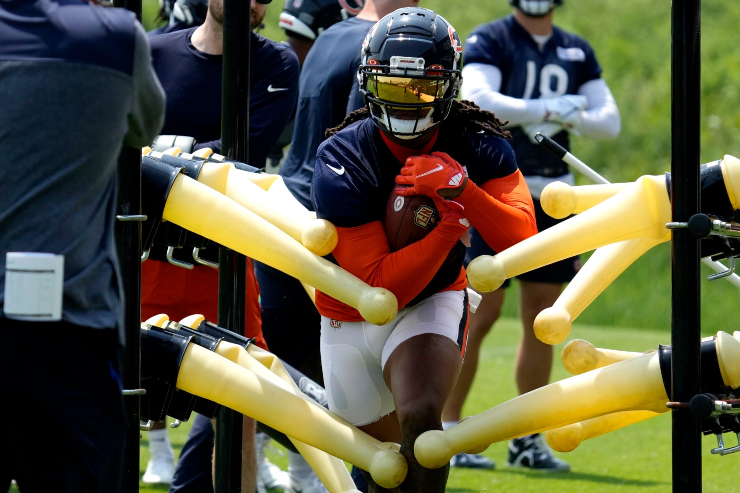 Chicago Bears running back D'Onta Foreman works on the field during NFL football OTA practice in Lake Forest, Ill., Wednesday, June 7, 2023. (AP Photo/Nam Y. Huh)