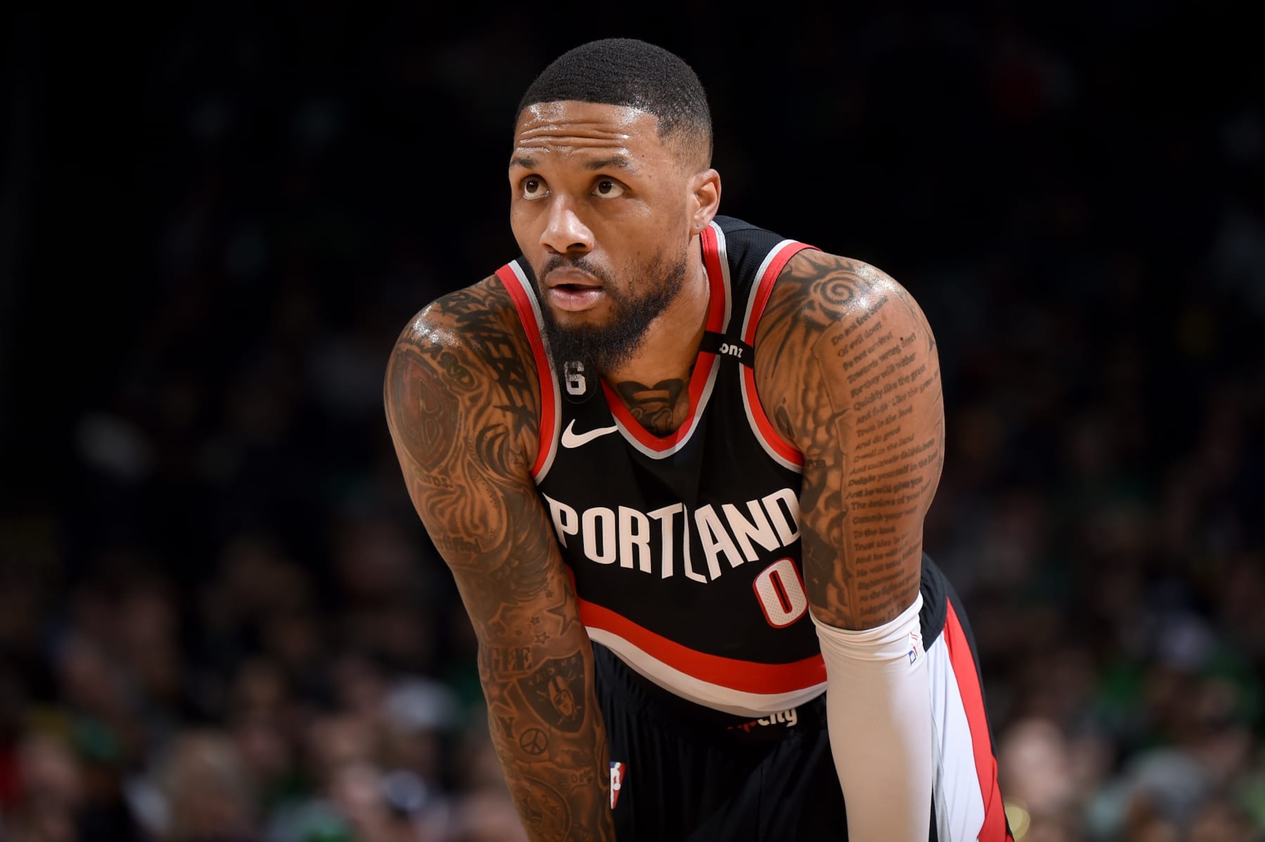 BOSTON, MA - MARCH 8: Damian Lillard #0 of the Portland Trail Blazers looks on during the game against the Boston Celtics on March 8, 2023 at the TD Garden in Boston, Massachusetts. NOTE TO USER: User expressly acknowledges and agrees that, by downloading and or using this photograph, User is consenting to the terms and conditions of the Getty Images License Agreement. Mandatory Copyright Notice: Copyright 2023 NBAE  (Photo by Brian Babineau/NBAE via Getty Images)