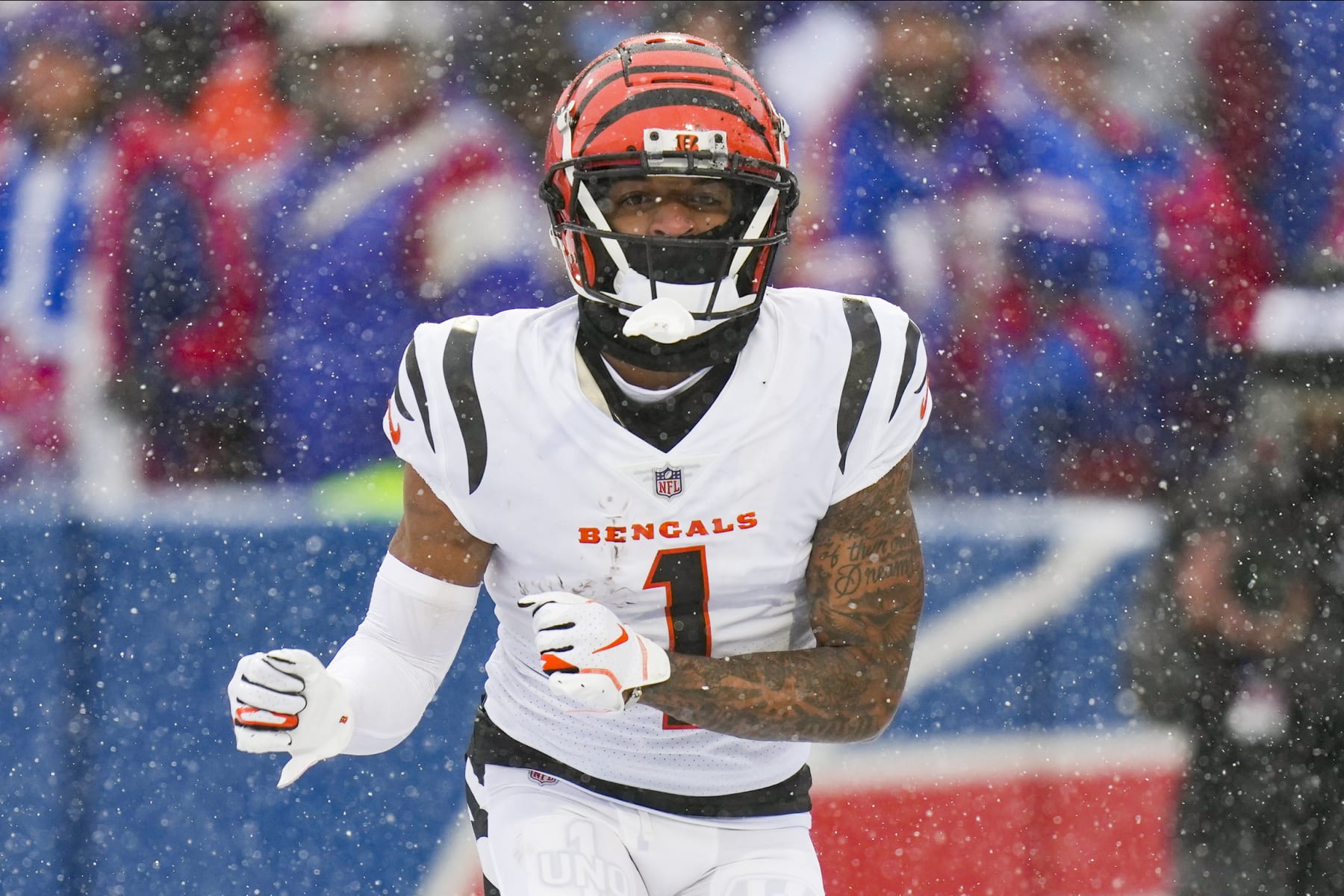 Cincinnati Bengals wide receiver Ja'Marr Chase (1) reacts after making a touchdown catch against the Buffalo Bills during the first quarter of an NFL division round football game, Sunday, Jan. 22, 2023, in Orchard Park, N.Y. (AP Photo/Seth Wenig)
