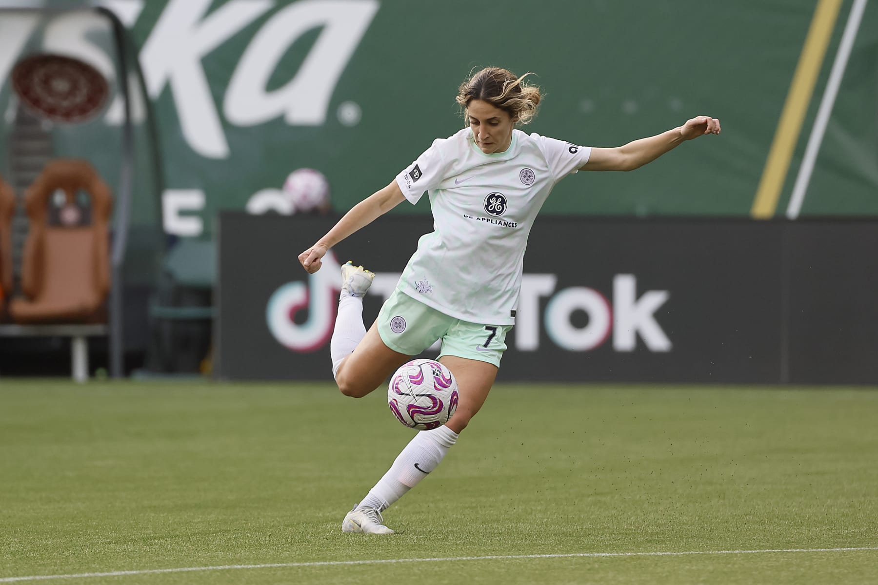 Savannah DeMelo #7 of the Racing Louisville shoots the ball during the first half against the Under-23 Women's National Team at Providence Park on March 18, 2023 in Portland, Oregon.