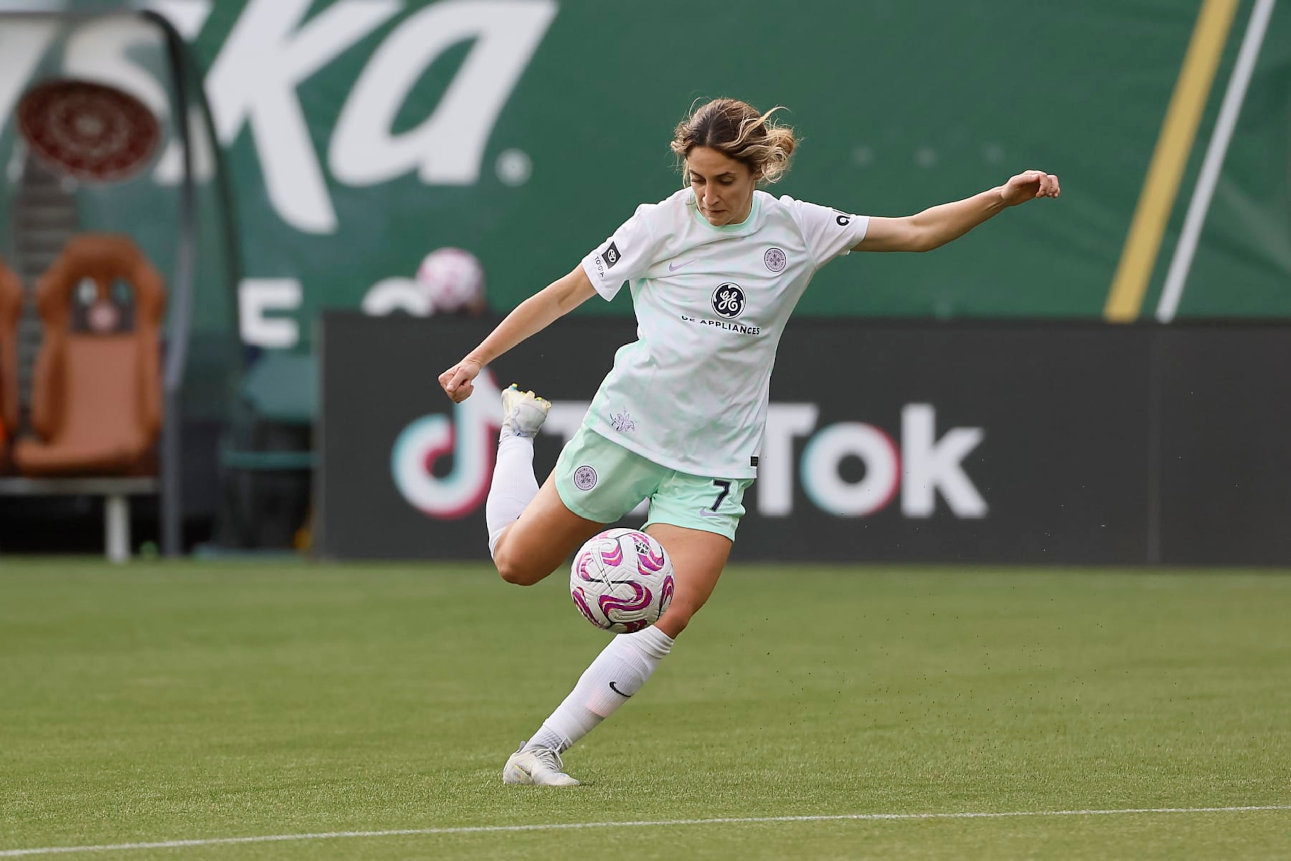 Savannah DeMelo #7 of the Racing Louisville shoots the ball during the first half against the Under-23 Women's National Team at Providence Park on March 18, 2023 in Portland, Oregon.