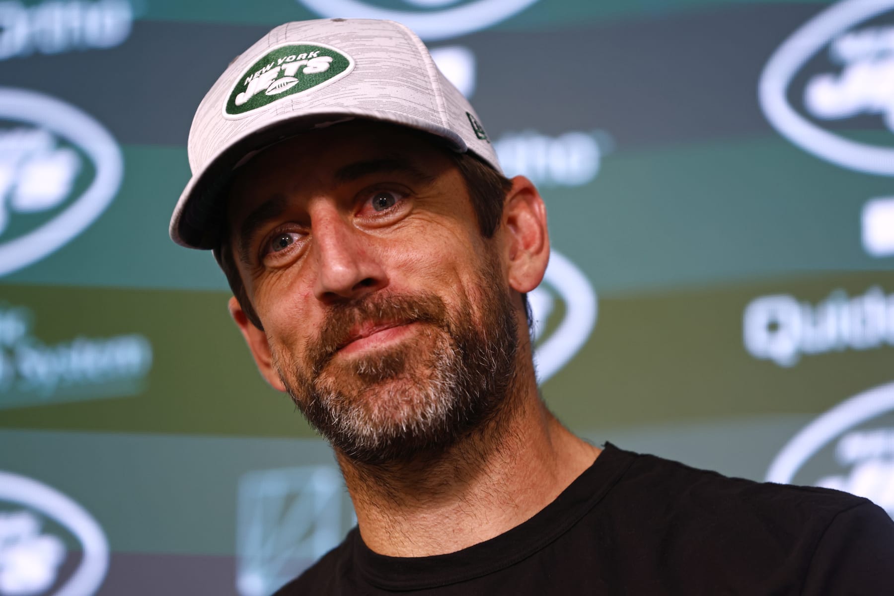 FLORHAM PARK, NEW JERSEY - JUNE 9: Quarterback Aaron Rodgers #8 of the New York Jets talks to reporters after the teams OTAs at Atlantic Health Jets Training Center on June 9, 2023 in Florham Park, New Jersey. (Photo by Rich Schultz/Getty Images)