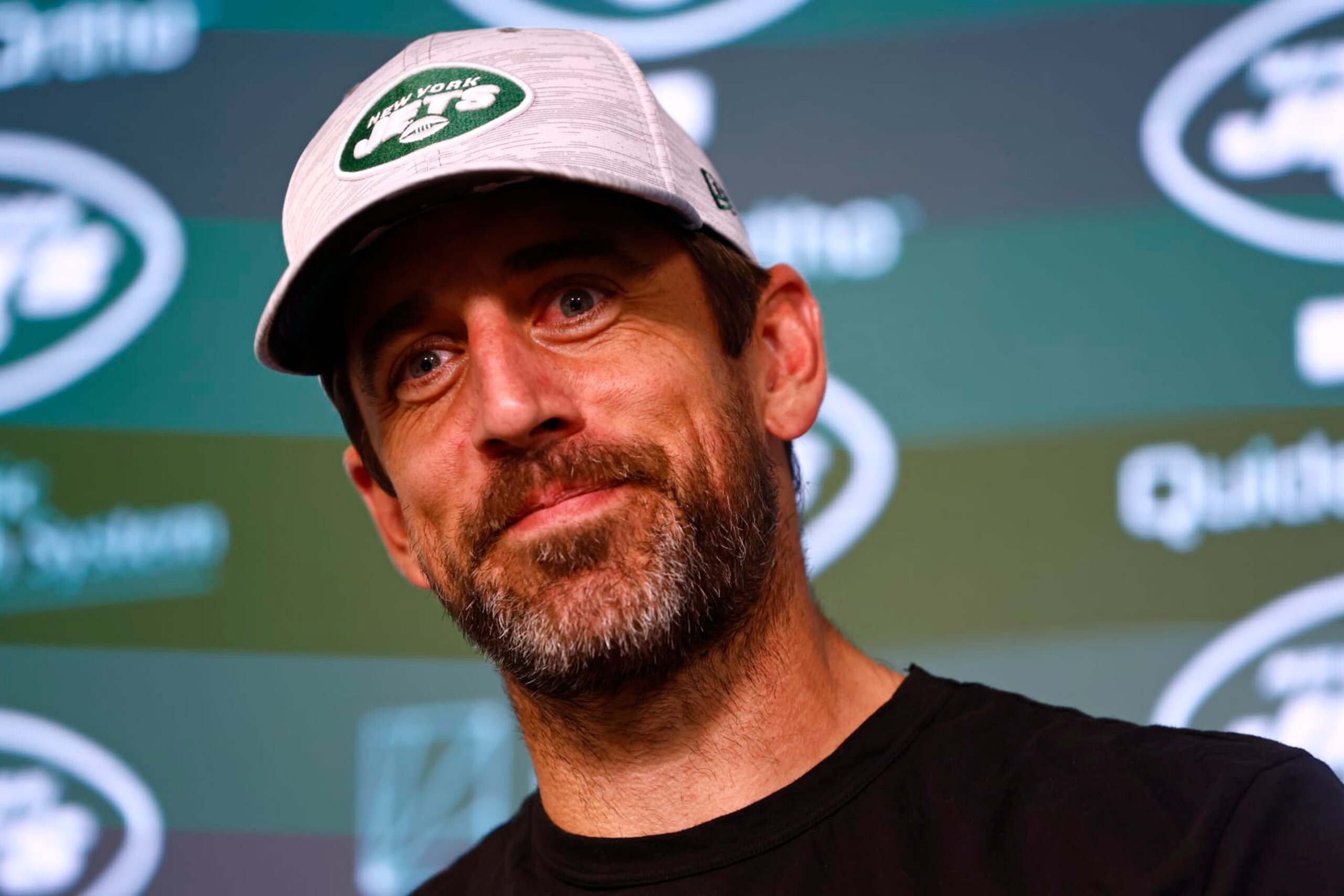 FLORHAM PARK, NEW JERSEY - JUNE 9: Quarterback Aaron Rodgers #8 of the New York Jets talks to reporters after the teams OTAs at Atlantic Health Jets Training Center on June 9, 2023 in Florham Park, New Jersey. (Photo by Rich Schultz/Getty Images)