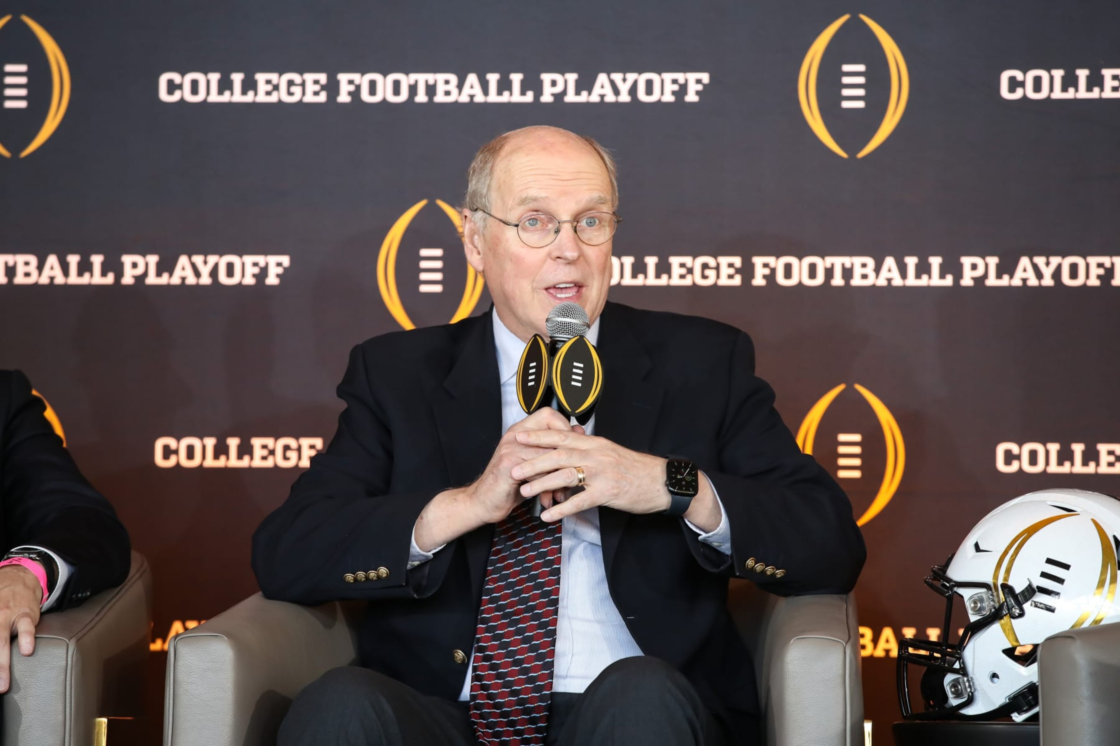 LOS ANGELES, CA - NOVEMBER 19: CFP President Bill Hancock during the College Football Playoff press conference and media roundtable on November 19, 2022, at Banc of California Stadium in Los Angeles, CA. (Photo by Jevone Moore/Icon Sportswire via Getty Images) LOS ANGELES, CA - NOVEMBER 19: CFP President Bill Hancock during the College Football Playoff press conference and media roundtable on November 19, 2022, at Banc of California Stadium in Los Angeles, CA. (Photo by Jevone Moore/Icon Sportswire via Getty Images)
