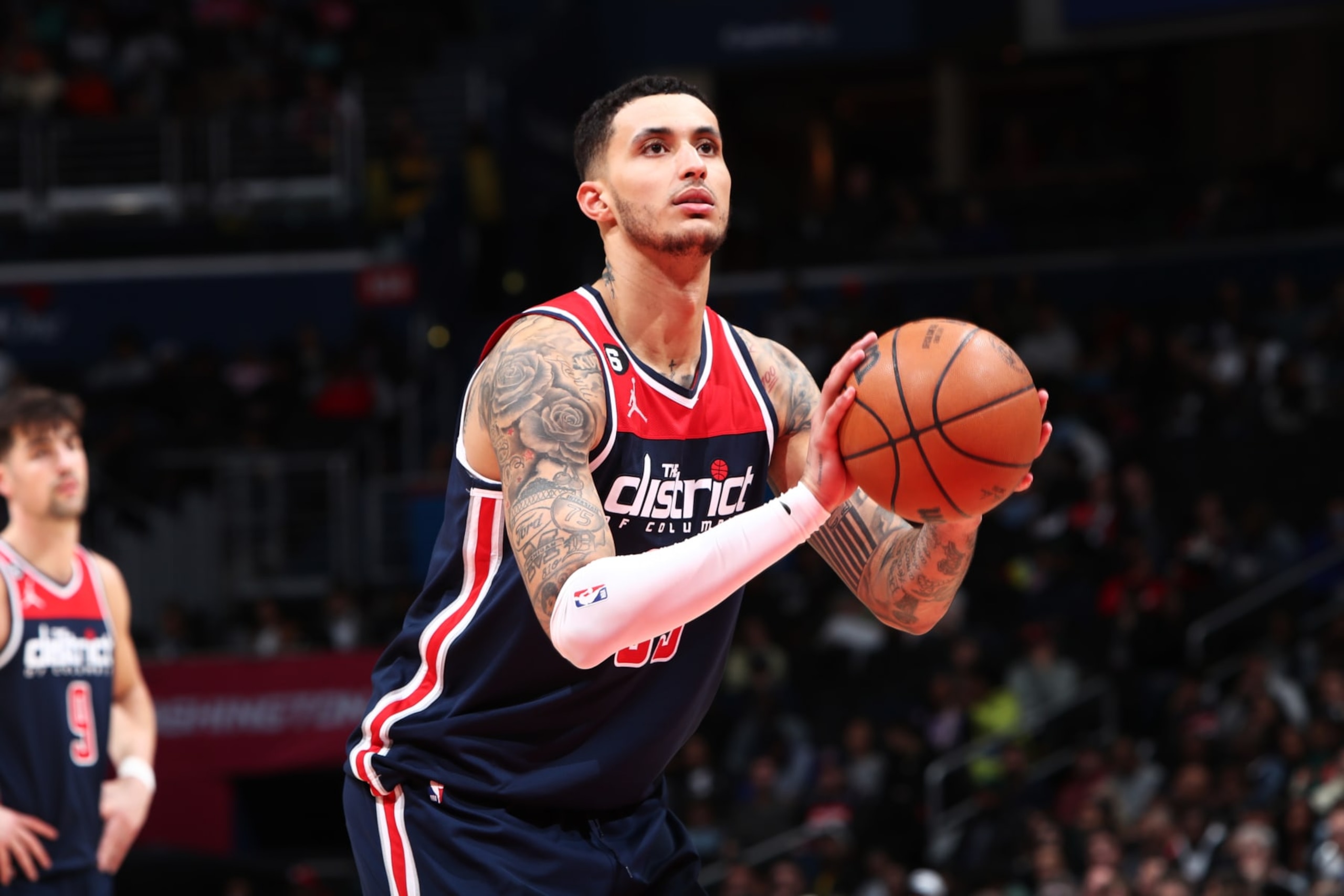 WASHINGTON, DC -  MARCH 18: Kyle Kuzma #33 of the Washington Wizards shoots a free throw during the game against the Sacramento Kings on March 18, 2023 at Capital One Arena in Washington, DC. NOTE TO USER: User expressly acknowledges and agrees that, by downloading and or using this Photograph, user is consenting to the terms and conditions of the Getty Images License Agreement. Mandatory Copyright Notice: Copyright 2023 NBAE (Photo by Kenny Giarla/NBAE via Getty Images)