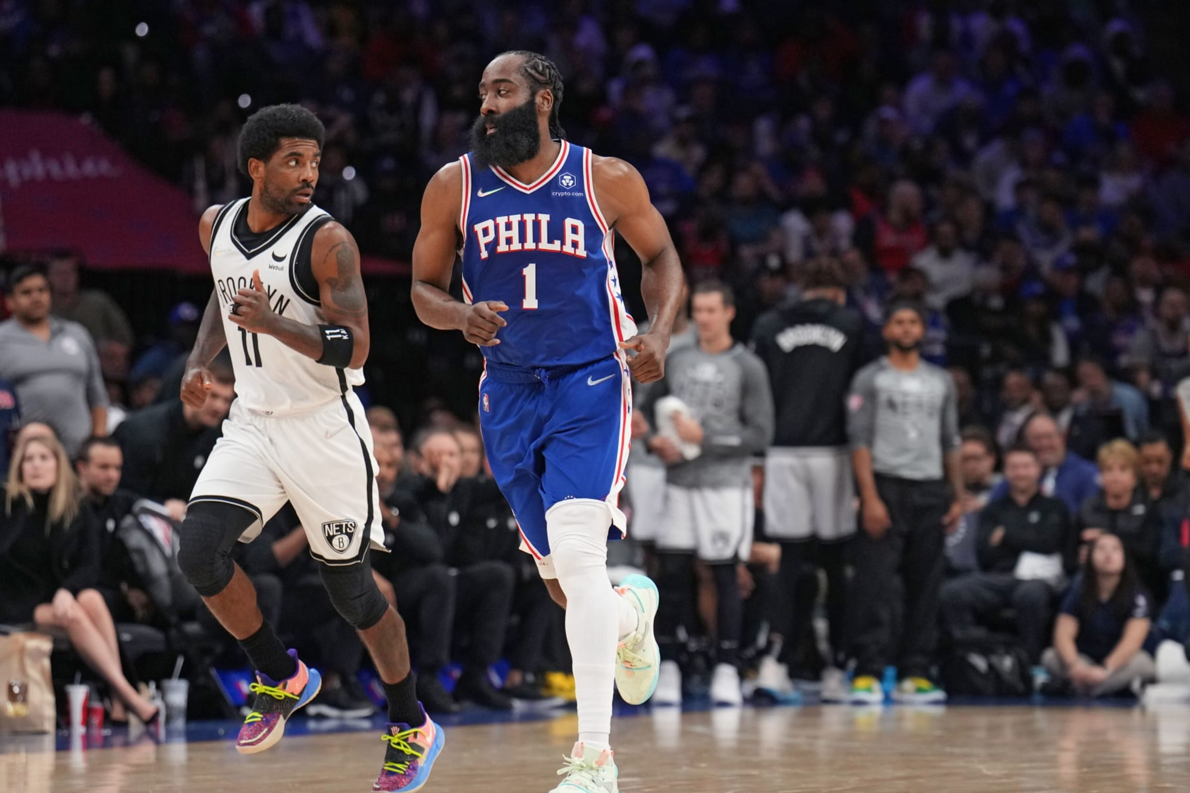 PHILADELPHIA, PA - MARCH 10: Kyrie Irving #11 of the Brooklyn Nets and James Harden #1 of the Philadelphia 76ers run on during a game on March 10, 2022 at Wells Fargo Center in Philadelphia, Pennsylvania. NOTE TO USER: User expressly acknowledges and agrees that, by downloading and/or using this Photograph, user is consenting to the terms and conditions of the Getty Images License Agreement. Mandatory Copyright Notice: Copyright 2022 NBAE (Photo by Jesse D. Garrabrant/NBAE via Getty Images)