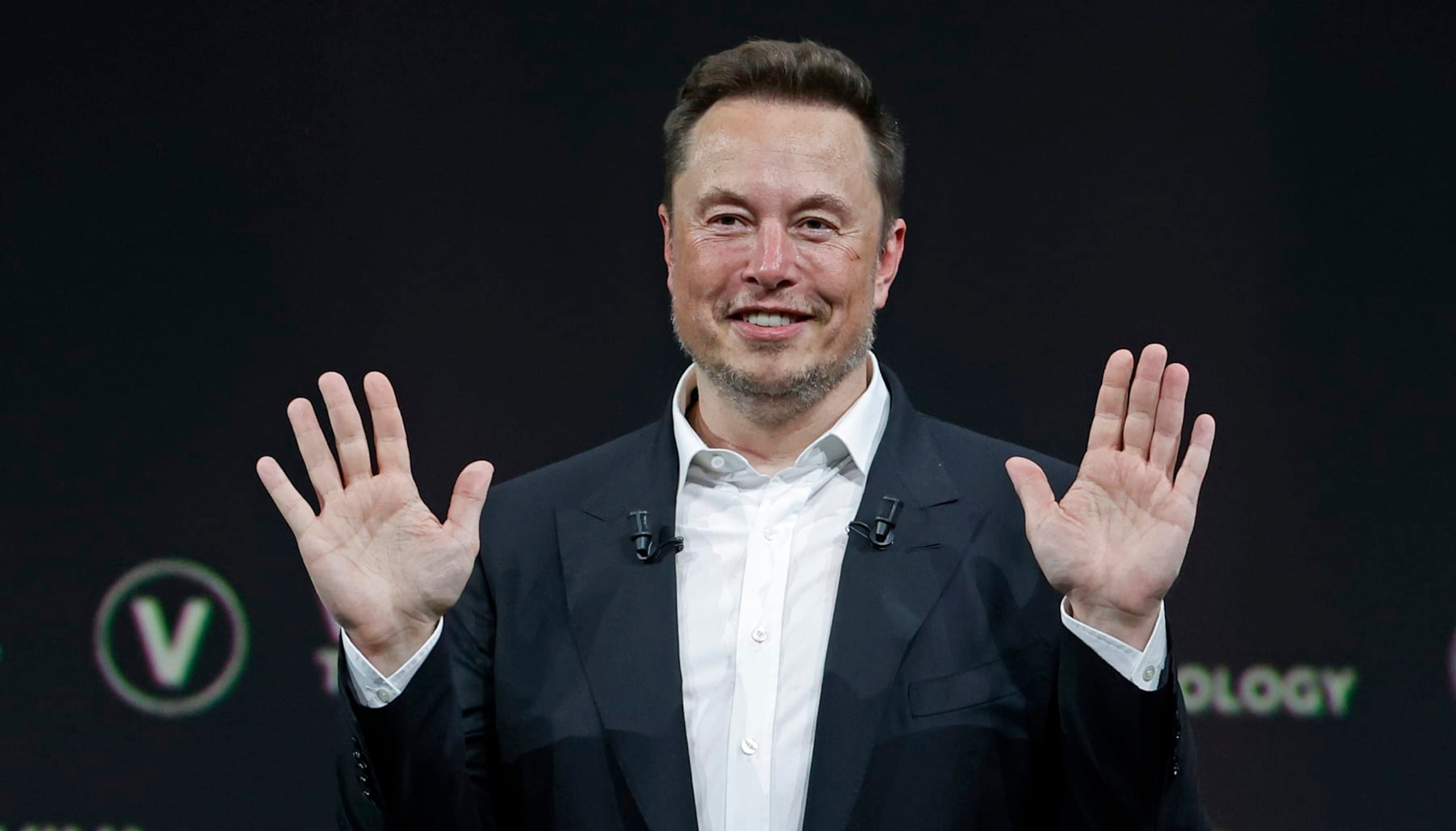 PARIS, FRANCE - JUNE 16: Chief Executive Officer of SpaceX and Tesla and owner of Twitter, Elon Musk gestures as he attends the Viva Technology conference dedicated to innovation and startups at the Porte de Versailles exhibition centre on June 16, 2023 in Paris, France. Elon Musk is visiting Paris for the VivaTech show where he gives a conference in front of 4,000 technology enthusiasts. He also took the opportunity to meet Bernard Arnaud, CEO of LVMH and the French President. Emmanuel Macron, who has already met Elon Musk twice in recent months, hopes to convince him to set up a Tesla battery factory in France, his pioneer company in electric cars. (Photo by Chesnot/Getty Images) PARIS, FRANCE - JUNE 16: Chief Executive Officer of SpaceX and Tesla and owner of Twitter, Elon Musk gestures as he attends the Viva Technology conference dedicated to innovation and startups at the Porte de Versailles exhibition centre on June 16, 2023 in Paris, France. Elon Musk is visiting Paris for the VivaTech show where he gives a conference in front of 4,000 technology enthusiasts. He also took the opportunity to meet Bernard Arnaud, CEO of LVMH and the French President. Emmanuel Macron, who has already met Elon Musk twice in recent months, hopes to convince him to set up a Tesla battery factory in France, his pioneer company in electric cars. (Photo by Chesnot/Getty Images)