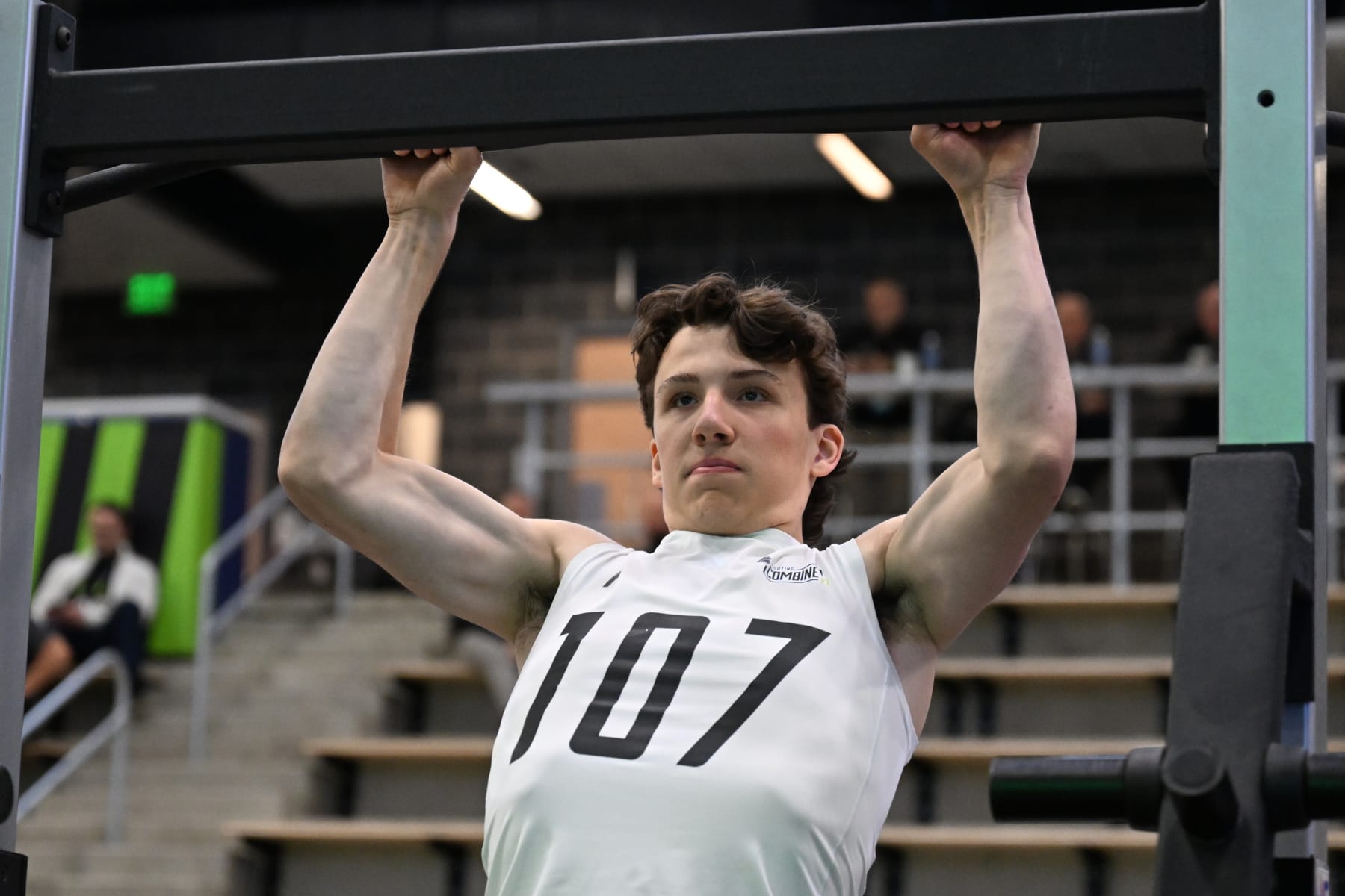 BUFFALO, NEW YORK - JUNE 10: Gabriel Perreault #107 performs pull-ups during the 2023 NHL Scouting Combine at the LECOM Harborcenter on June 10, 2023 in Buffalo, New York. (Photo by Joe Hrycych/NHLI via Getty Images)