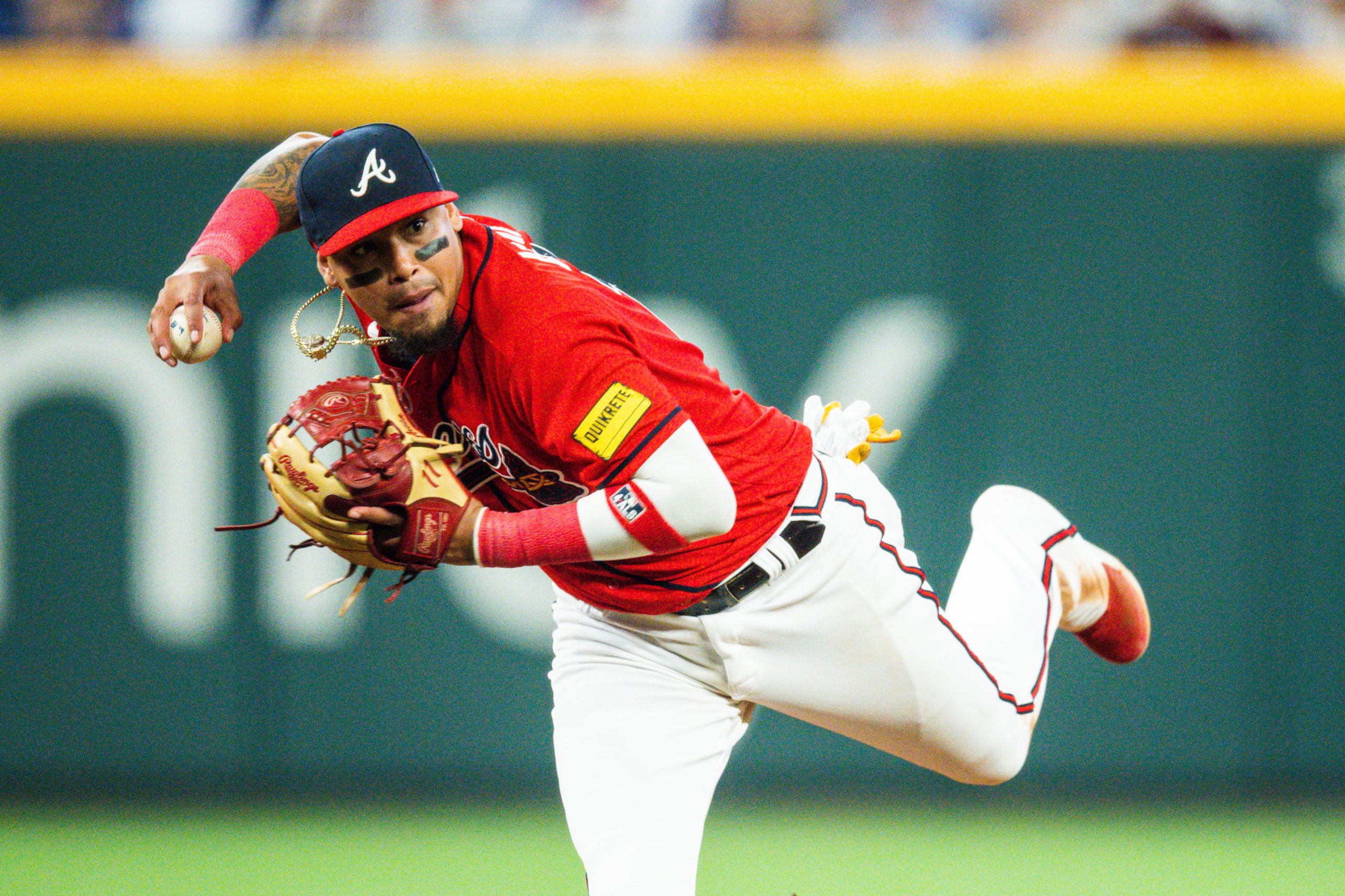 ATLANTA, GA - JUNE 16: Orlando Arcia #11 of the Atlanta Braves makes a throw to first to end the game during the ninth inning against the Colorado Rockies at Truist Park on June 16, 2023 in Atlanta, Georgia. (Photo by Kevin D. Liles/Atlanta Braves/Getty Images)