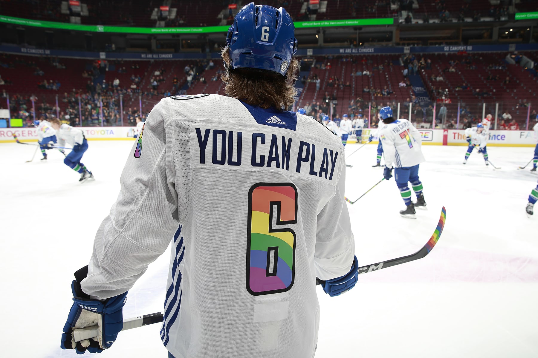 VANCOUVER, CANADA - MARCH 31: Brock Boeser #6 of the Vancouver Canucks warms up in his You can play Pride night jersey before their NHL game against the Calgary Flames at Rogers Arena March 31, 2023 in Vancouver, British Columbia, Canada.  (Photo by Jeff Vinnick/NHLI via Getty Images)