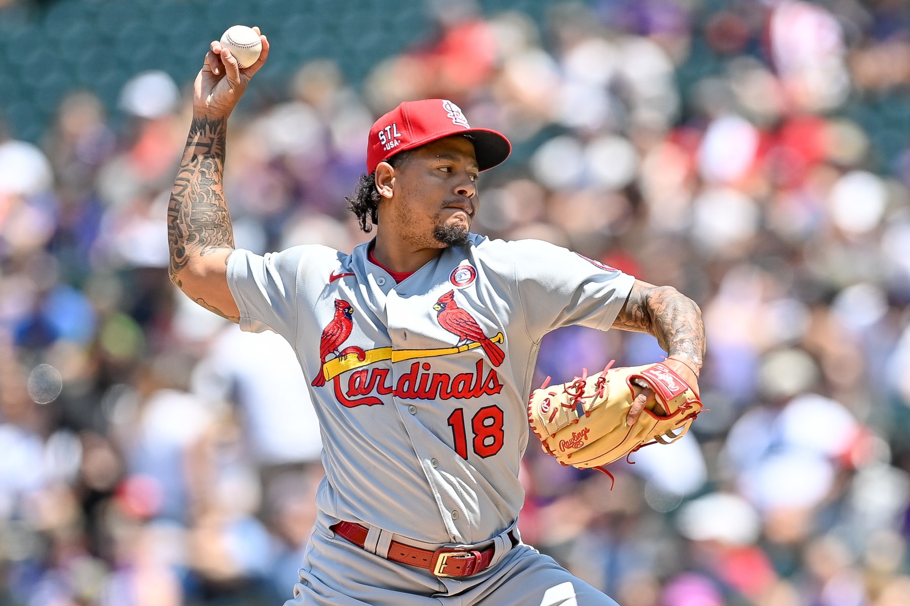 DENVER, CO - JULY 04: Carlos Martinez #18 of the St. Louis Cardinals pitches against the Colorado Rockies in the first inning of a game at Coors Field on July 4, 2021 in Denver, Colorado. (Photo by Dustin Bradford/Getty Images)