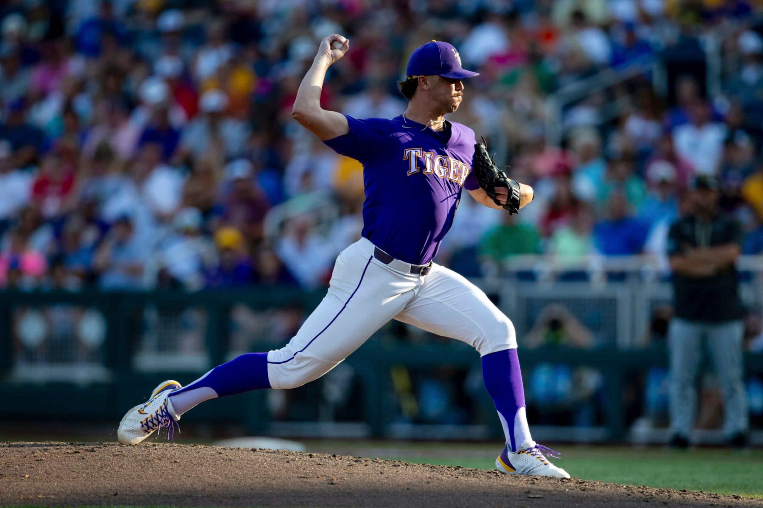 LSU pitcher Paul Skenes throws to a Wake Forest batter during the fifth inning in a baseball game at the NCAA College World Series in Omaha, Neb., Thursday, June 22, 2023. (AP Photo/John Peterson)