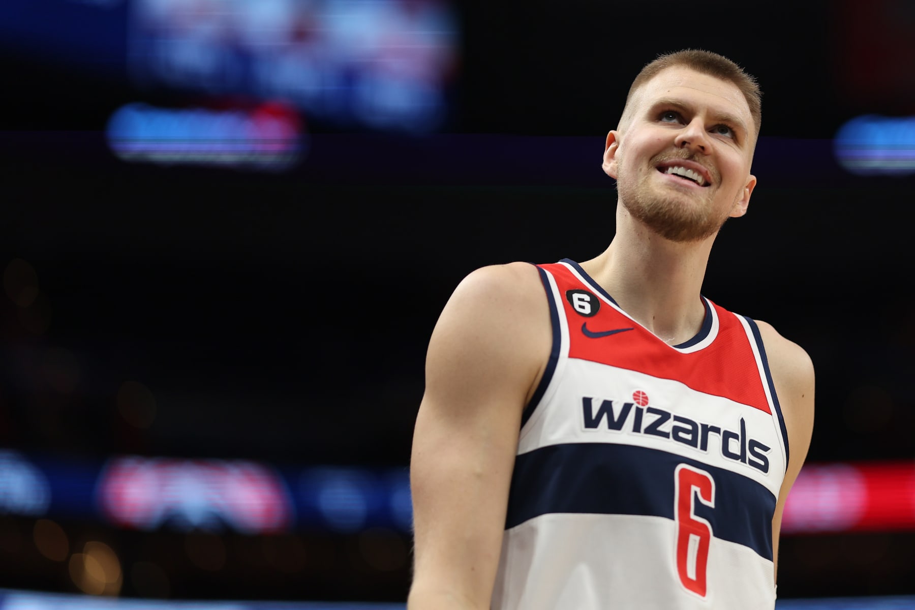 WASHINGTON, DC - FEBRUARY 08: Kristaps Porzingis #6 of the Washington Wizards reacts against the Charlotte Hornets during the second half at Capital One Arena on February 08, 2023 in Washington, DC. NOTE TO USER: User expressly acknowledges and agrees that, by downloading and or using this photograph, User is consenting to the terms and conditions of the Getty Images License Agreement. (Photo by Patrick Smith/Getty Images)