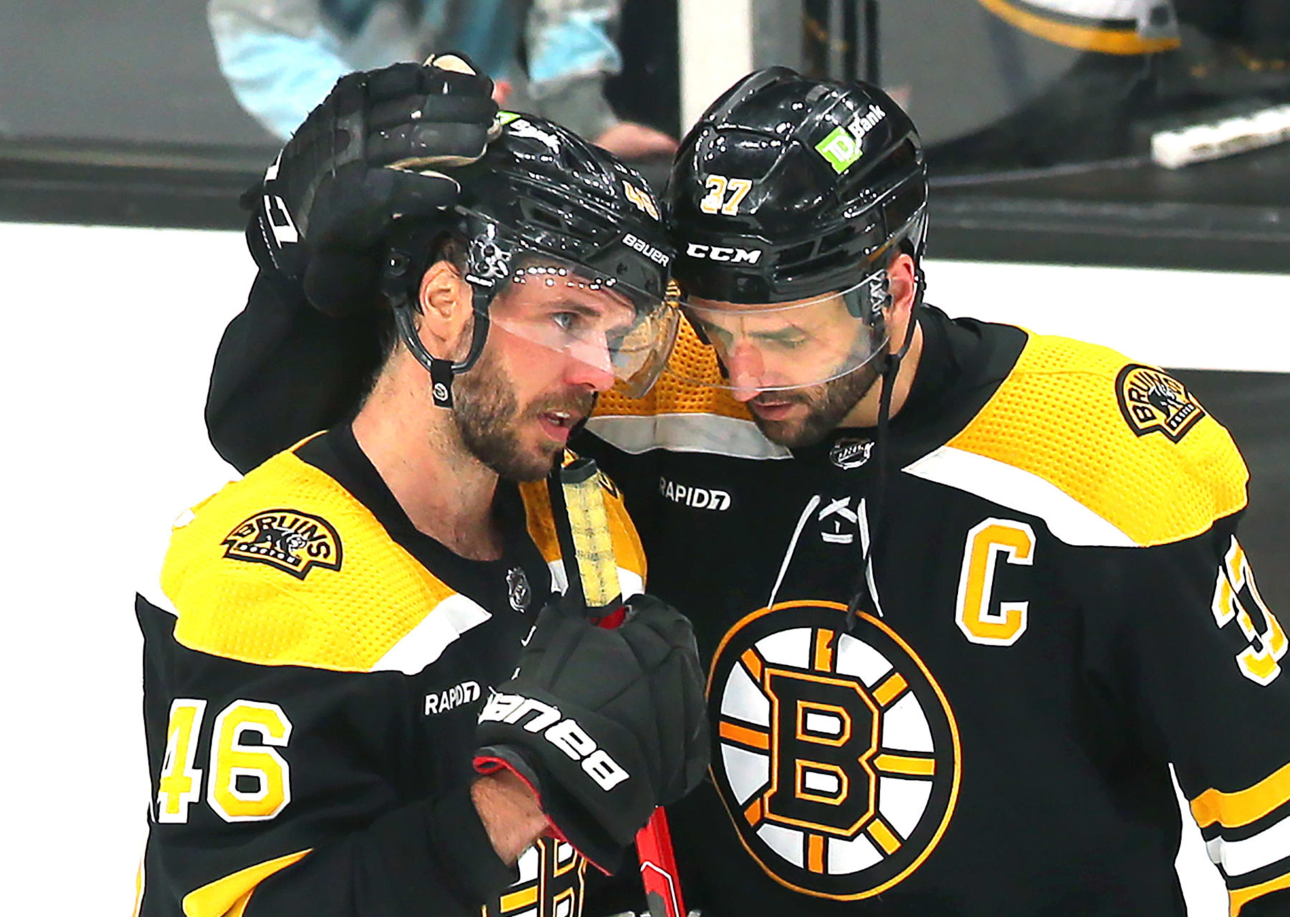 Boston, MA - April 30: Boston Bruins David Krejci, left, and Patrice Bergeron console each other following the game. The Bruins lost to the Florida Panthers, 4-3, in overtime of Game 7 of their Eastern Conference First Round Series. (Photo by John Tlumacki/The Boston Globe via Getty Images)