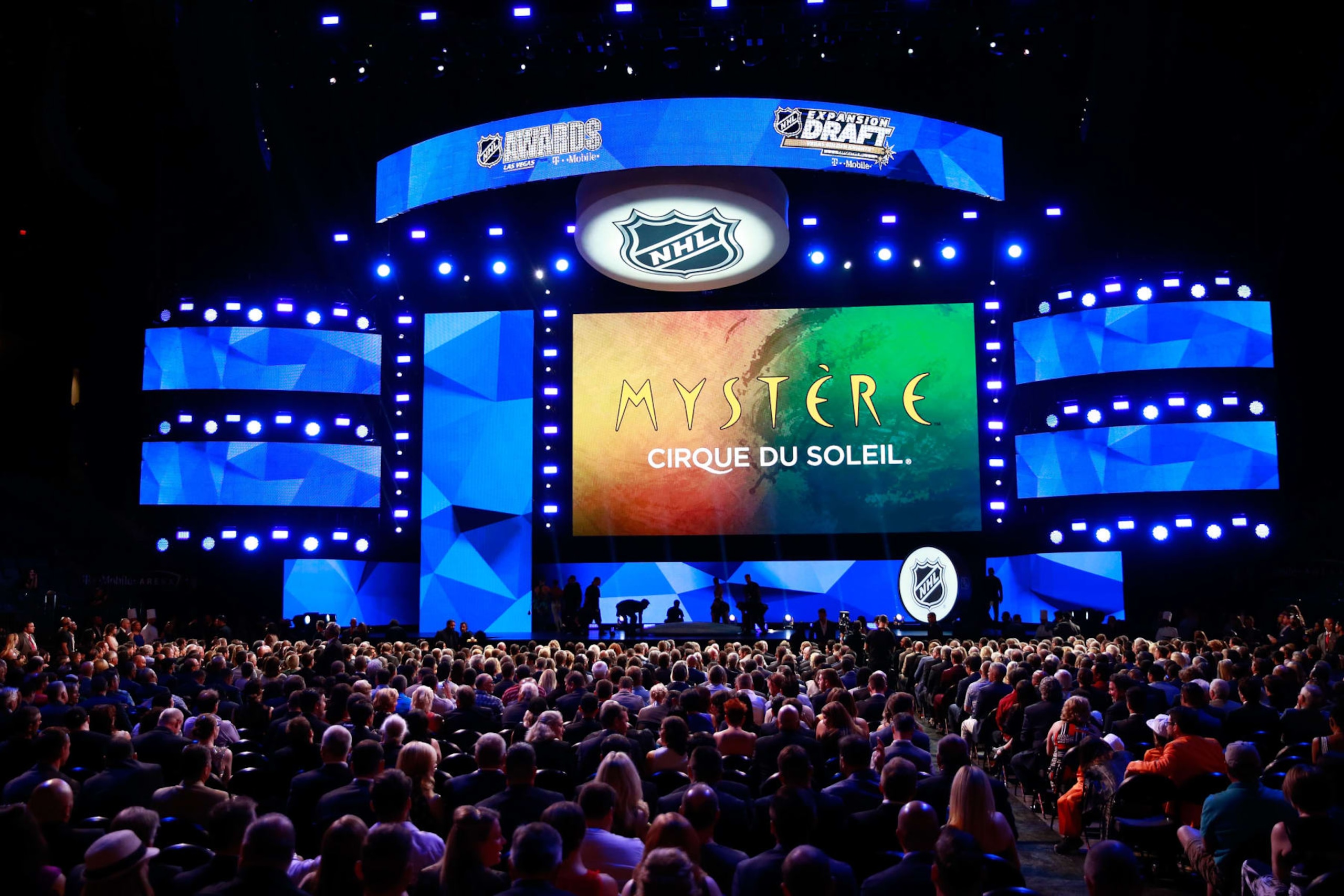 LAS VEGAS, NV - JUNE 21:  A general view shows a logo for "Mystere by Cirque du Soleil" on a screen during the 2017 NHL Awards & Expansion Draft at T-Mobile Arena on June 21, 2017 in Las Vegas, Nevada.  (Photo by Jeff Vinnick/NHLI via Getty Images)