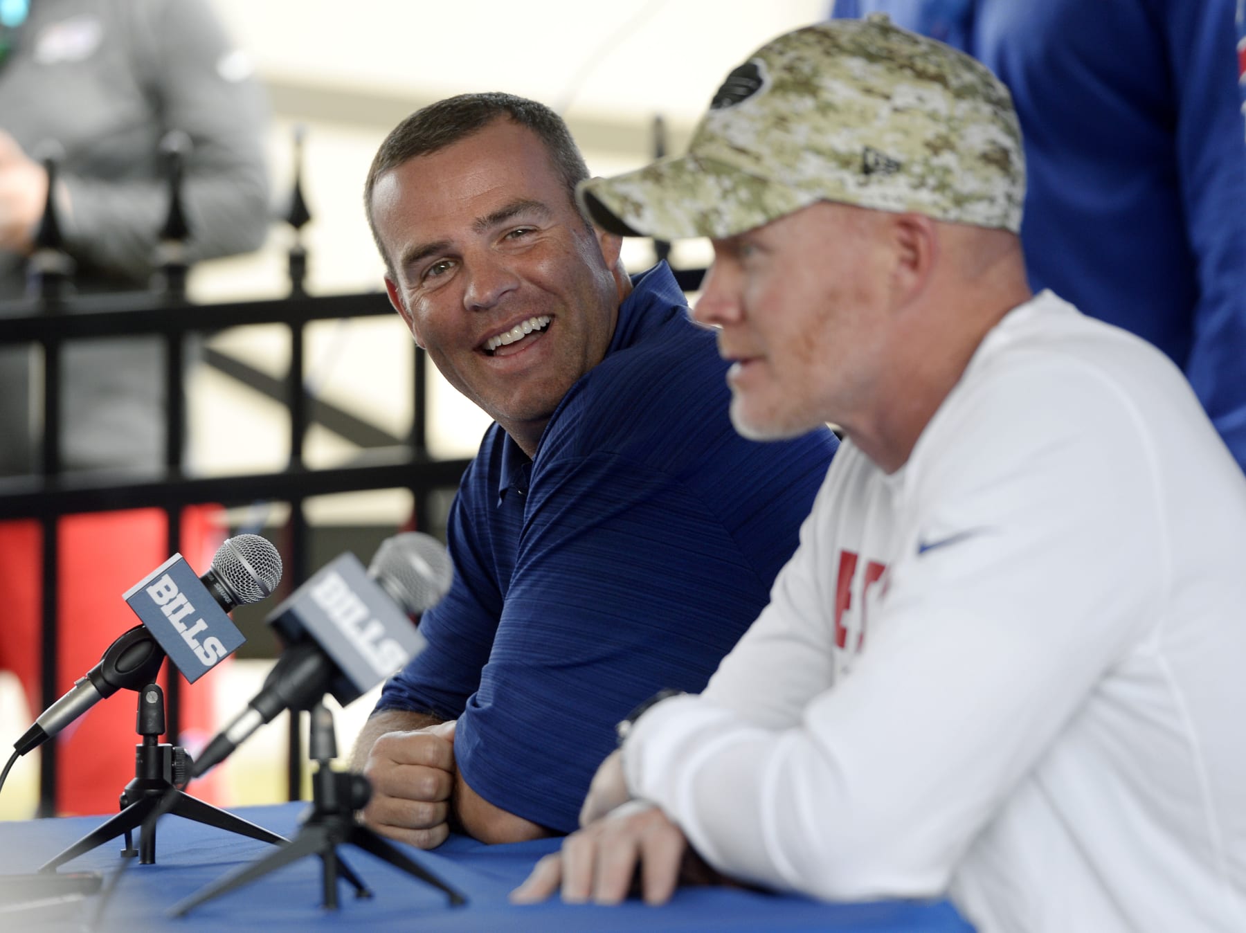 Buffalo Bills general manager Brandon Beane, left, and coach Sean McDermott speak to the media at the NFL football team's training camp in Pittsford, N.Y., Thursday, July 26, 2018. (AP Photo/Adrian Kraus)