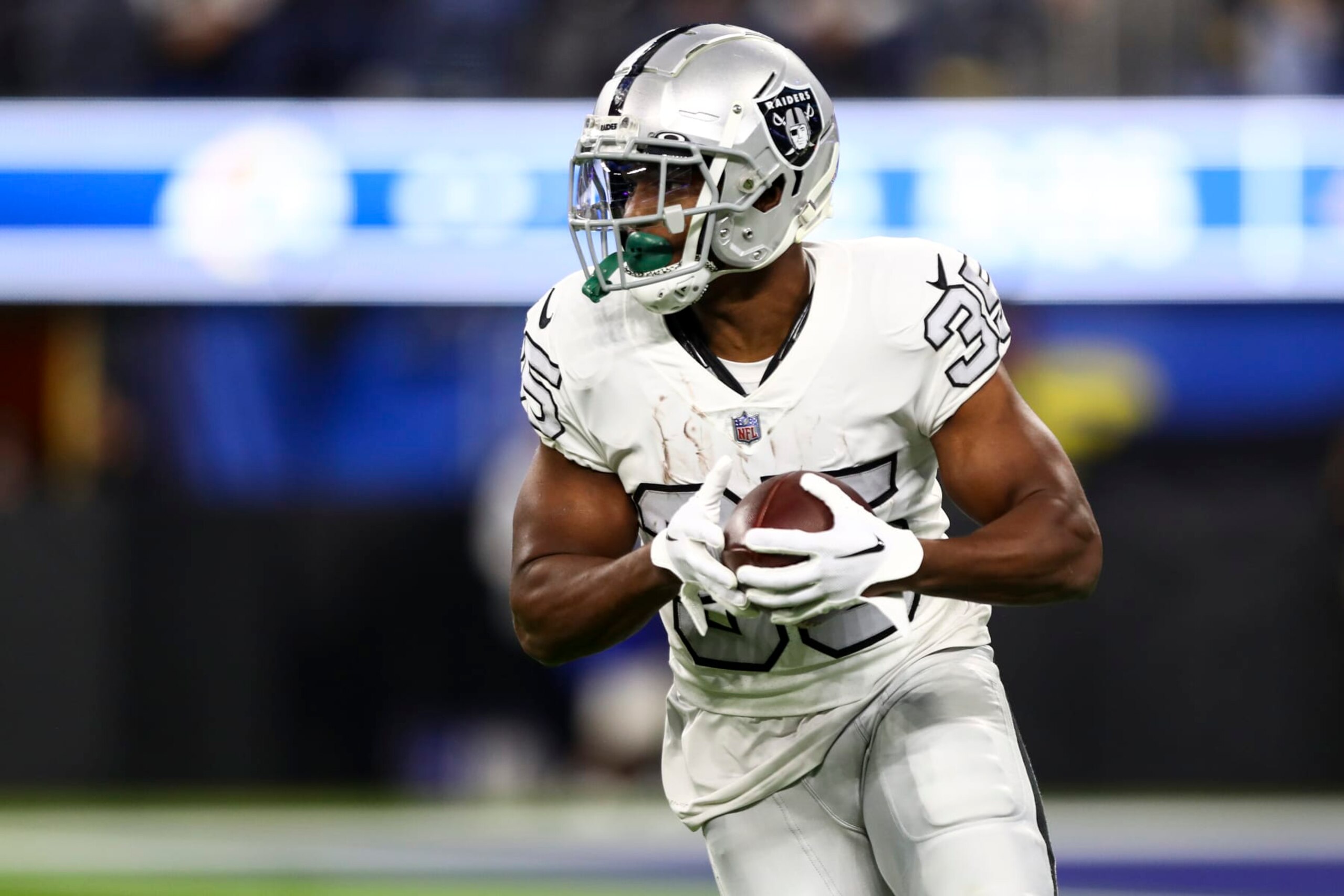 INGLEWOOD, CA - DECEMBER 8: Zamir White #35 of the Las Vegas Raiders carries the ball during an NFL football game against the Los Angeles Rams at SoFi Stadium on December 8, 2022 in Inglewood, California. (Photo by Kevin Sabitus/Getty Images)