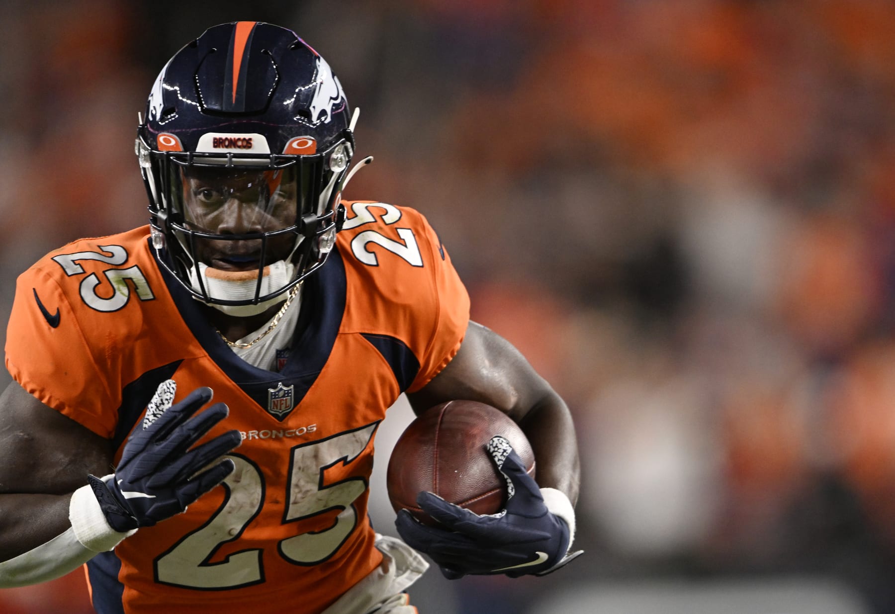 DENVER, COLORADO - OCTOBER 6: Denver Broncos running back Melvin Gordon III (25) rushes the ball up field at Empower Field on October 6, 2022 in Denver, Colorado. The hometown Denver Broncos lost 12 to 9 over the Indianapolis Colts in overtime during week 5 of the NFL season. (Photo by RJ Sangosti/MediaNews Group/The Denver Post via Getty Images)