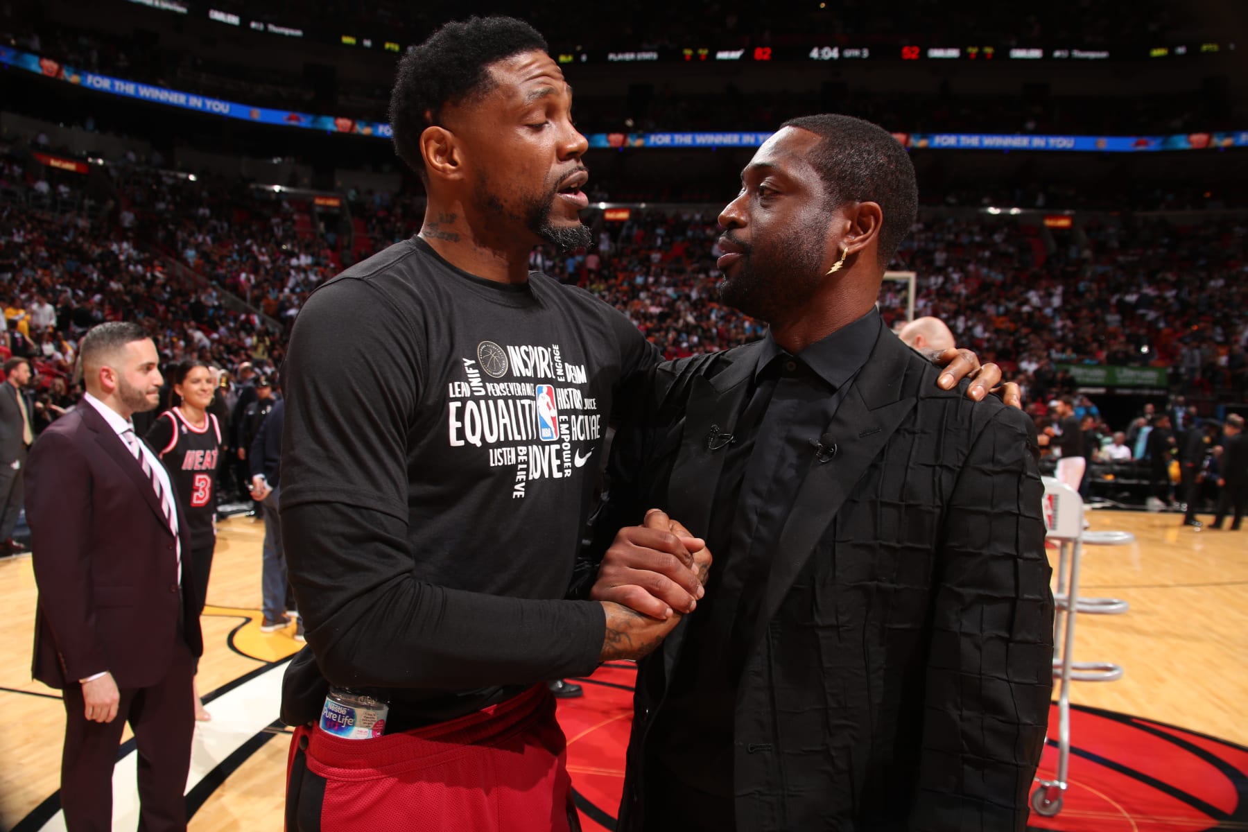 MIAMI, FL - FEBRUARY 22:  Dwyane Wade and Udonis Haslem #40 of the Miami Heat talk after Wade's jersey retirement ceremony on February 22, 2020 at American Airlines Arena in Miami, Florida. NOTE TO USER: User expressly acknowledges and agrees that, by downloading and or using this Photograph, user is consenting to the terms and conditions of the Getty Images License Agreement. Mandatory Copyright Notice: Copyright 2020 NBAE (Photo by Issac Baldizon/NBAE via Getty Images)