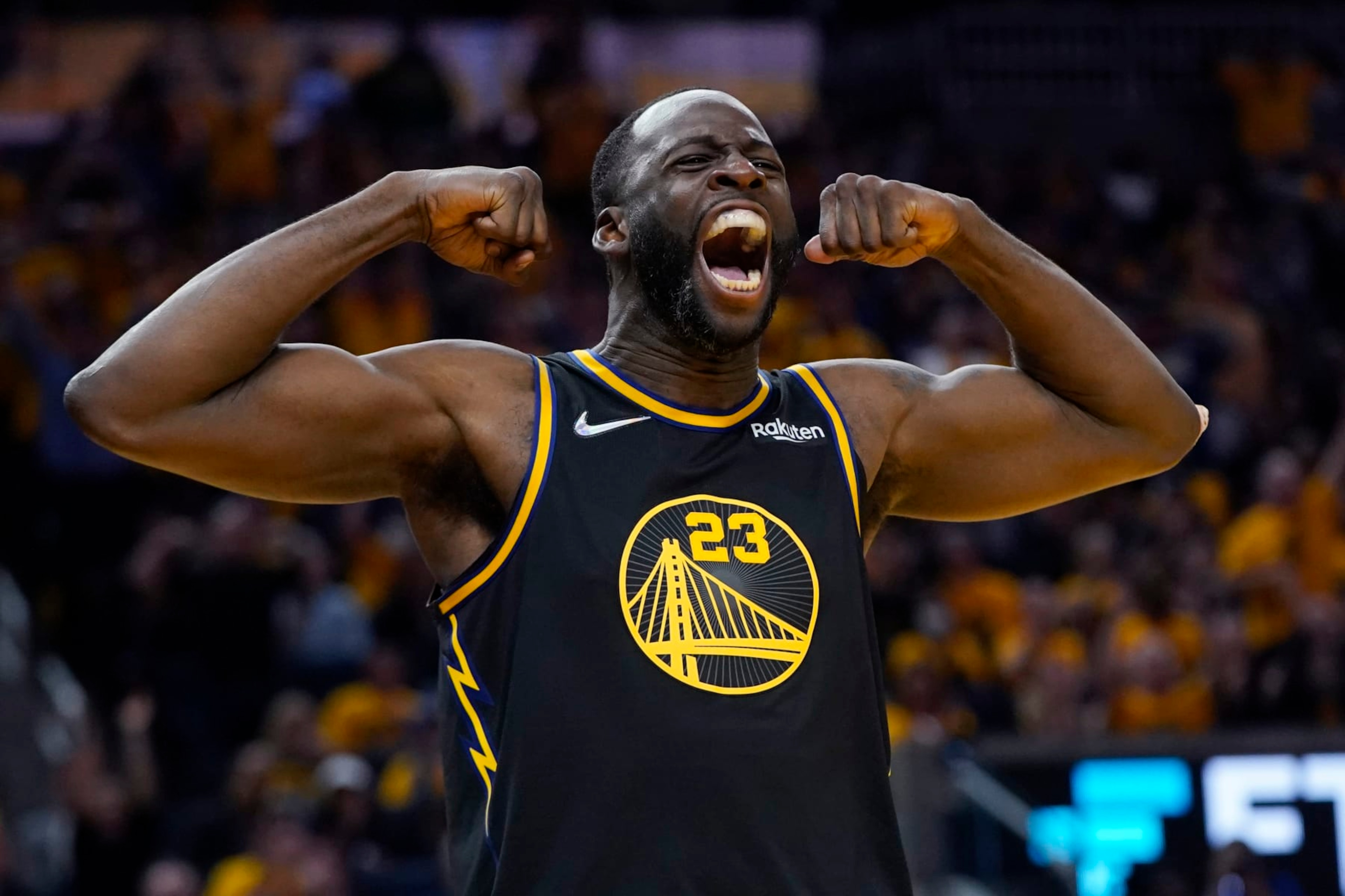 FILE - Golden State Warriors forward Draymond Green celebrates after scoring against the Dallas Mavericks during the second half in Game 5 of the NBA basketball playoffs Western Conference finals in San Francisco, Thursday, May 26, 2022. The Warriors want to keep Green, yet the team is prepared for him to formally decline his $27.5 million player option for the final year of his contract next season and become an unrestricted free agent seeking a long-term deal. (AP Photo/Jeff Chiu, File) FILE - Golden State Warriors forward Draymond Green celebrates after scoring against the Dallas Mavericks during the second half in Game 5 of the NBA basketball playoffs Western Conference finals in San Francisco, Thursday, May 26, 2022. The Warriors want to keep Green, yet the team is prepared for him to formally decline his $27.5 million player option for the final year of his contract next season and become an unrestricted free agent seeking a long-term deal. (AP Photo/Jeff Chiu, File)