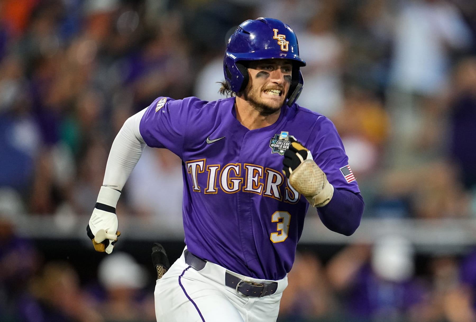 OMAHA, NEBRASKA - JUNE 22: Dylan Crews #3 of the LSU Tigers runs to first base after hitting a single during the 11th inning against the Wake Forest Demon Deacons at Charles Schwab Field on June 22, 2023 in Omaha, Nebraska. LSU Tigers defeated Wake Forest Demon Deacons to advance to the NCAA College World Series Finals. (Photo by Jay Biggerstaff/Getty Images)