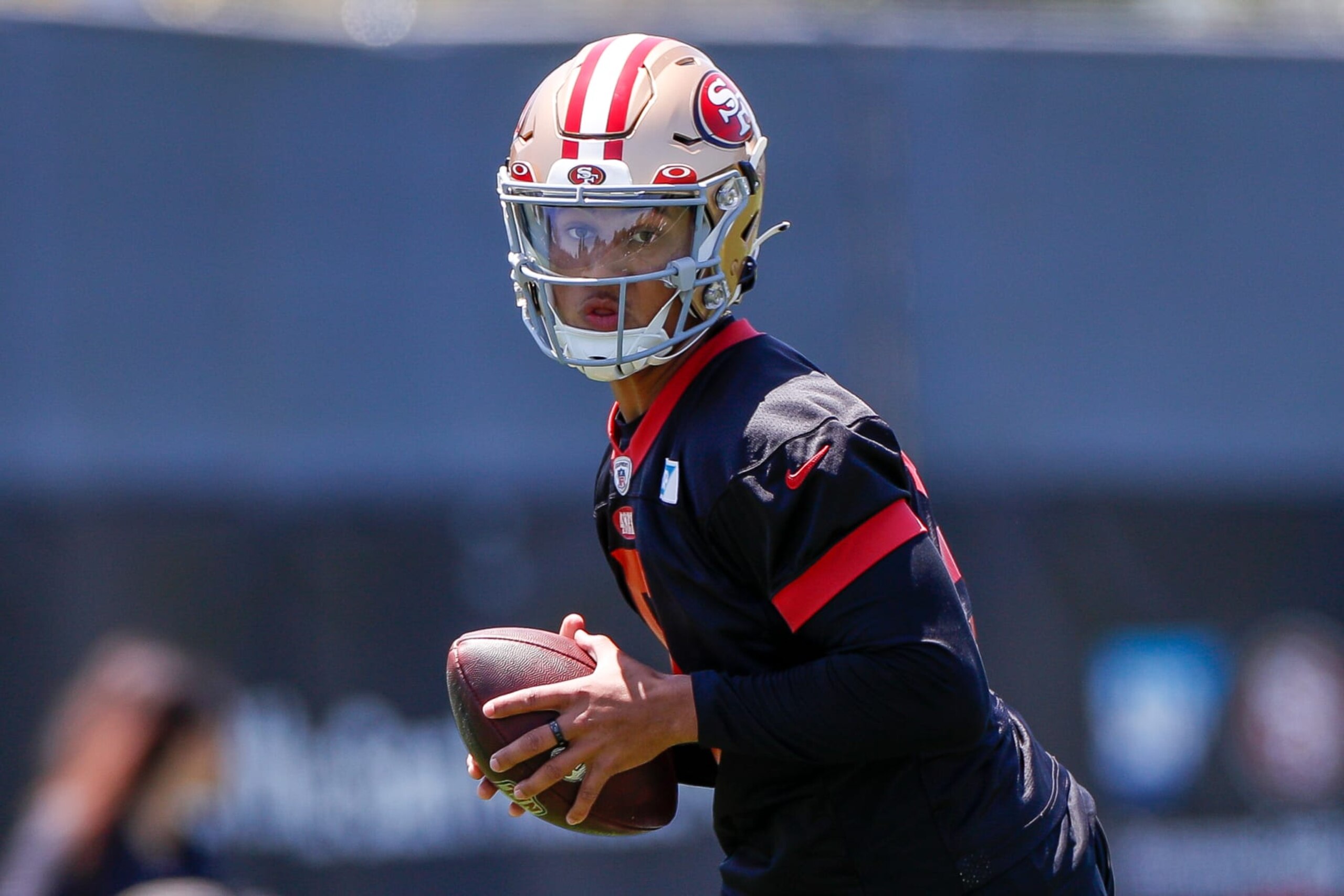 SANTA CLARA, CA - MAY 31: San Francisco 49ers quarterback Trey Lance (5) looks to throw a pass during the team's OTA practice on May 31, 2023, at the SAP Performance Facility in Santa Clara, CA. (Photo by Brandon Sloter/Icon Sportswire via Getty Images)