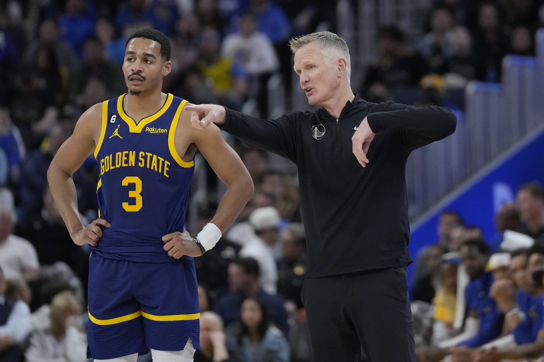 Golden State Warriors guard Jordan Poole (3) and head coach Steve Kerr during an NBA basketball game against the Oklahoma City Thunder in San Francisco, Tuesday, April 4, 2023. (AP Photo/Jeff Chiu)