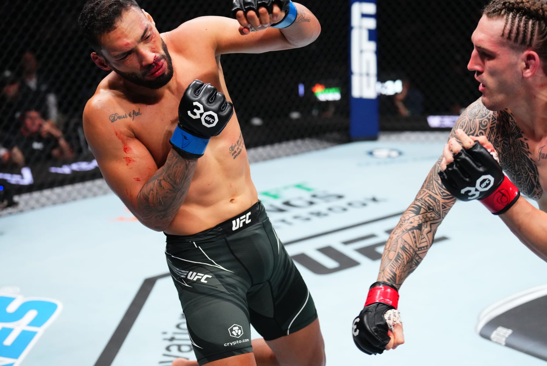 JACKSONVILLE, FLORIDA - JUNE 24:  (R-L) Brendan Allen punches Bruno Silva of Brazil in their middleweight fight during the UFC Fight Night event at Vystar Veterans Memorial Arena on June 24, 2023 in Jacksonville, Florida. (Photo by Josh Hedges/Zuffa LLC)
