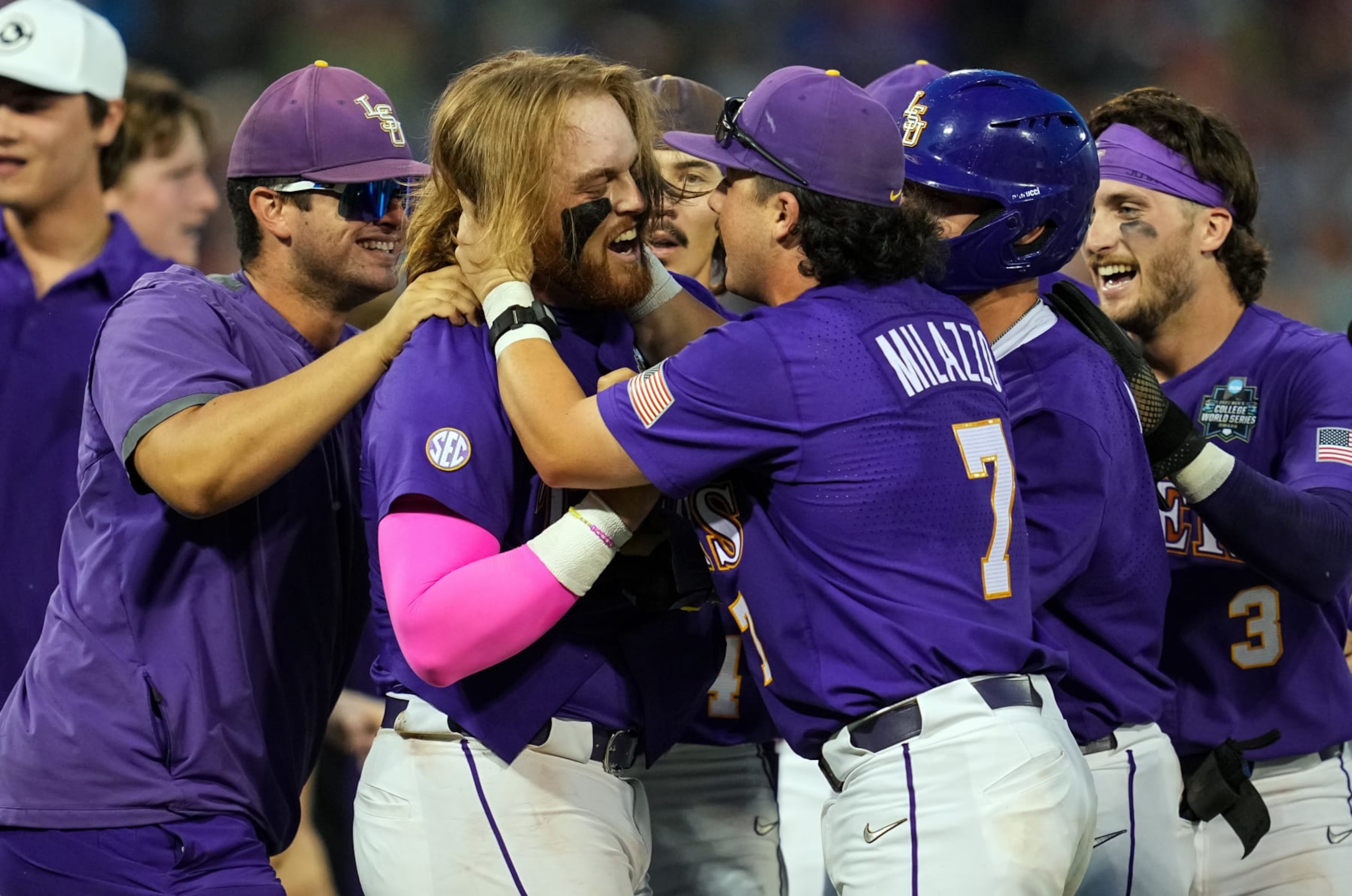 OMAHA, NEBRASKA - JUNE 22: Tommy White #47 of the LSU Tigers celebrates with teammates after hitting a walk-off home run during the 11th inning against the Wake Forest Demon Deacons at Charles Schwab Field on June 22, 2023 in Omaha, Nebraska. LSU Tigers defeated Wake Forest Demon Deacons 2-0 to advance to the NCAA College World Series Finals. (Photo by Jay Biggerstaff/Getty Images)