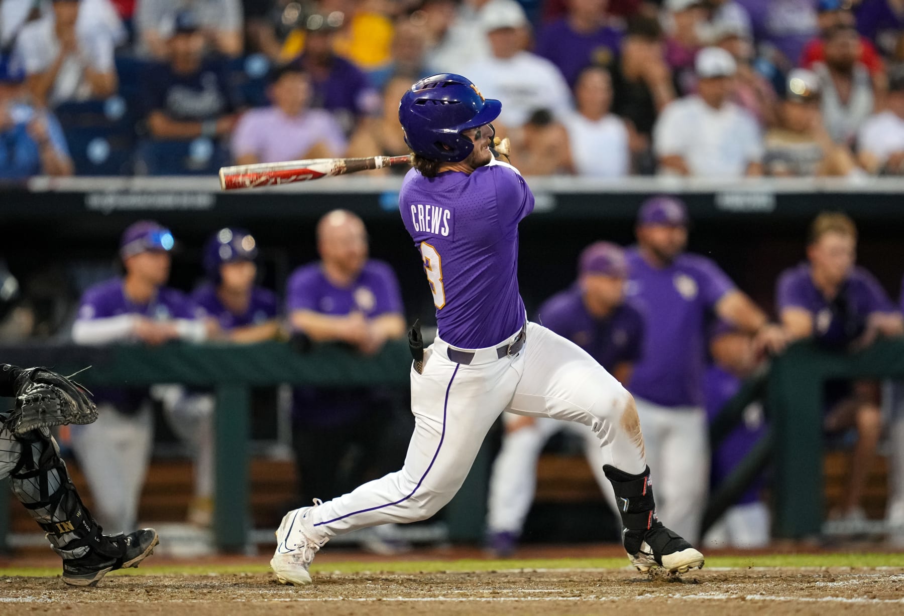 OMAHA, NEBRASKA - JUNE 22: Dylan Crews #3 of the LSU Tigers hits a single during the 11th inning against the Wake Forest Demon Deacons at Charles Schwab Field on June 22, 2023 in Omaha, Nebraska. LSU Tigers defeated Wake Forest Demon Deacons to advance to the NCAA College World Series Finals. (Photo by Jay Biggerstaff/Getty Images)