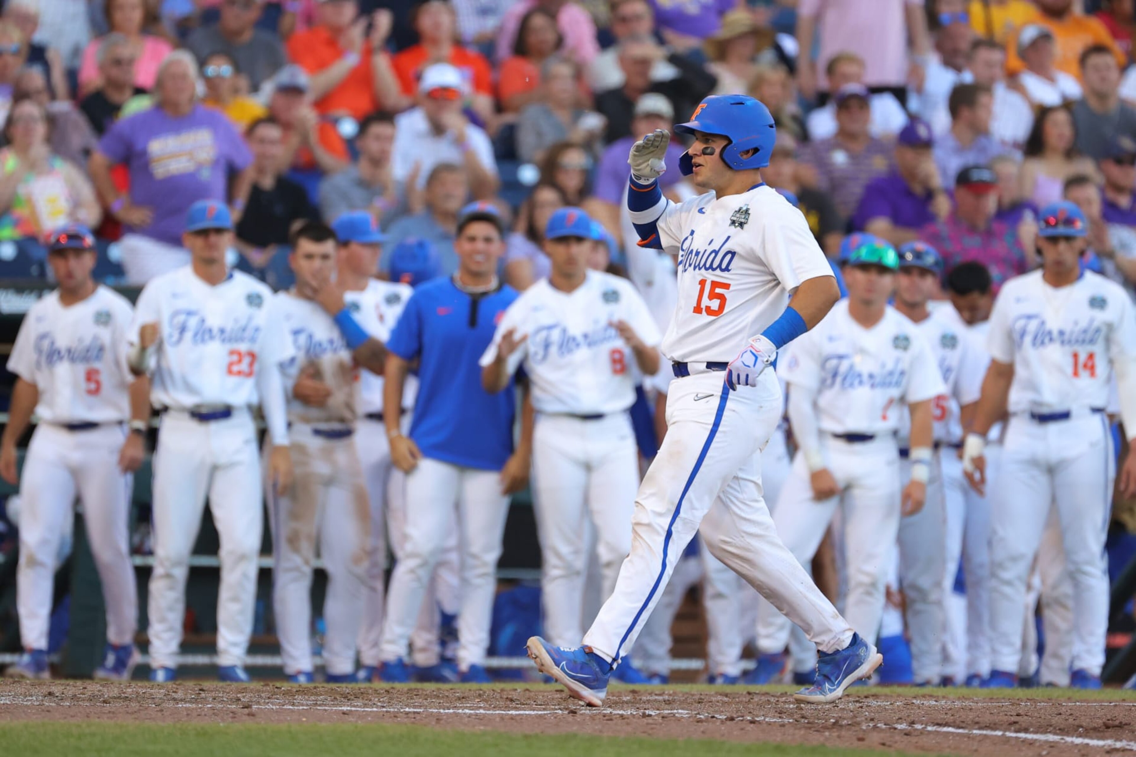 OMAHA, NE - JUNE 24: BT Riopelle #15 of the Florida Gators reacts to hitting a home run against the LSU Tigers during game one of the Division I Men's Baseball Championship held at Charles Schwab Field on June 24, 2023 in Omaha, Nebraska. (Photo by C. Morgan Engel/NCAA Photos via Getty Images) OMAHA, NE - JUNE 24: BT Riopelle #15 of the Florida Gators reacts to hitting a home run against the LSU Tigers during game one of the Division I Men's Baseball Championship held at Charles Schwab Field on June 24, 2023 in Omaha, Nebraska. (Photo by C. Morgan Engel/NCAA Photos via Getty Images)