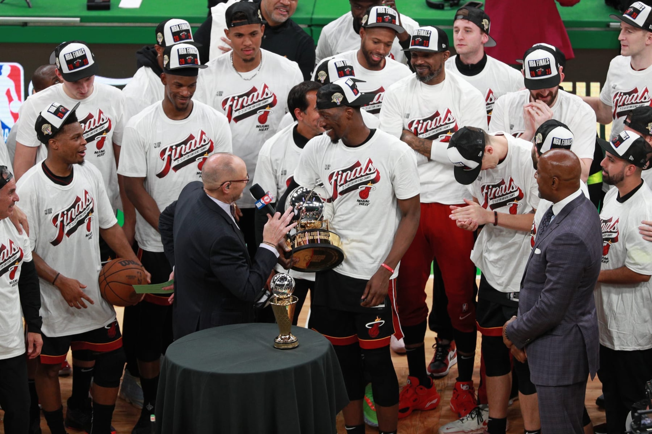 BOSTON, MA - MAY 29: Ernie Johnson and Alonzo Mourning present the Miami Heat with the Bob Cousy Trophy after winning  Game 7 of the Eastern Conference Finals 2023 NBA Playoffs against the Boston Celtics on May 29, 2023 at the TD Garden in Boston, Massachusetts. NOTE TO USER: User expressly acknowledges and agrees that, by downloading and or using this photograph, User is consenting to the terms and conditions of the Getty Images License Agreement. Mandatory Copyright Notice: Copyright 2023 NBAE  (Photo by Chris Marion/NBAE via Getty Images)