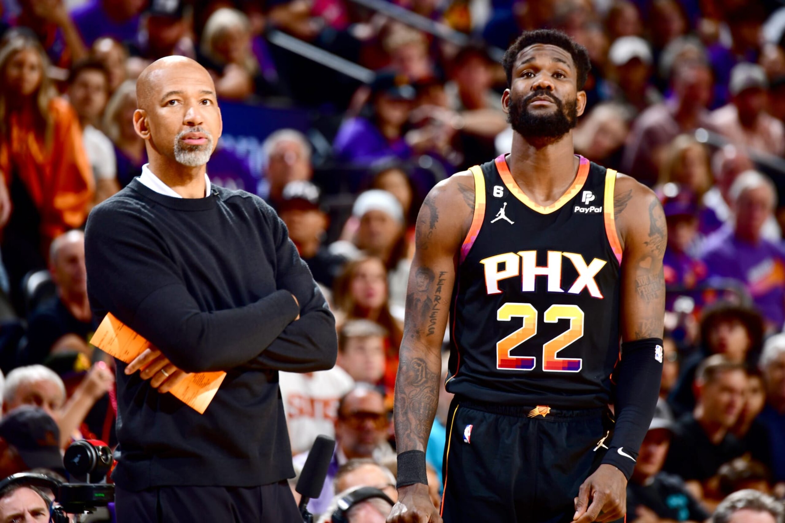 PHOENIX, AZ - MAY 5: Head Coach Monty Williams of the Phoenix Suns and Deandre Ayton #22 look on during Game 3 of the 2023 NBA Playoffs Western Conference Semi-Finals against the Denver Nuggets on May 5, 2023 at Footprint Center in Phoenix, Arizona. NOTE TO USER: User expressly acknowledges and agrees that, by downloading and or using this photograph, user is consenting to the terms and conditions of the Getty Images License Agreement. Mandatory Copyright Notice: Copyright 2023 NBAE (Photo by Barry Gossage/NBAE via Getty Images)