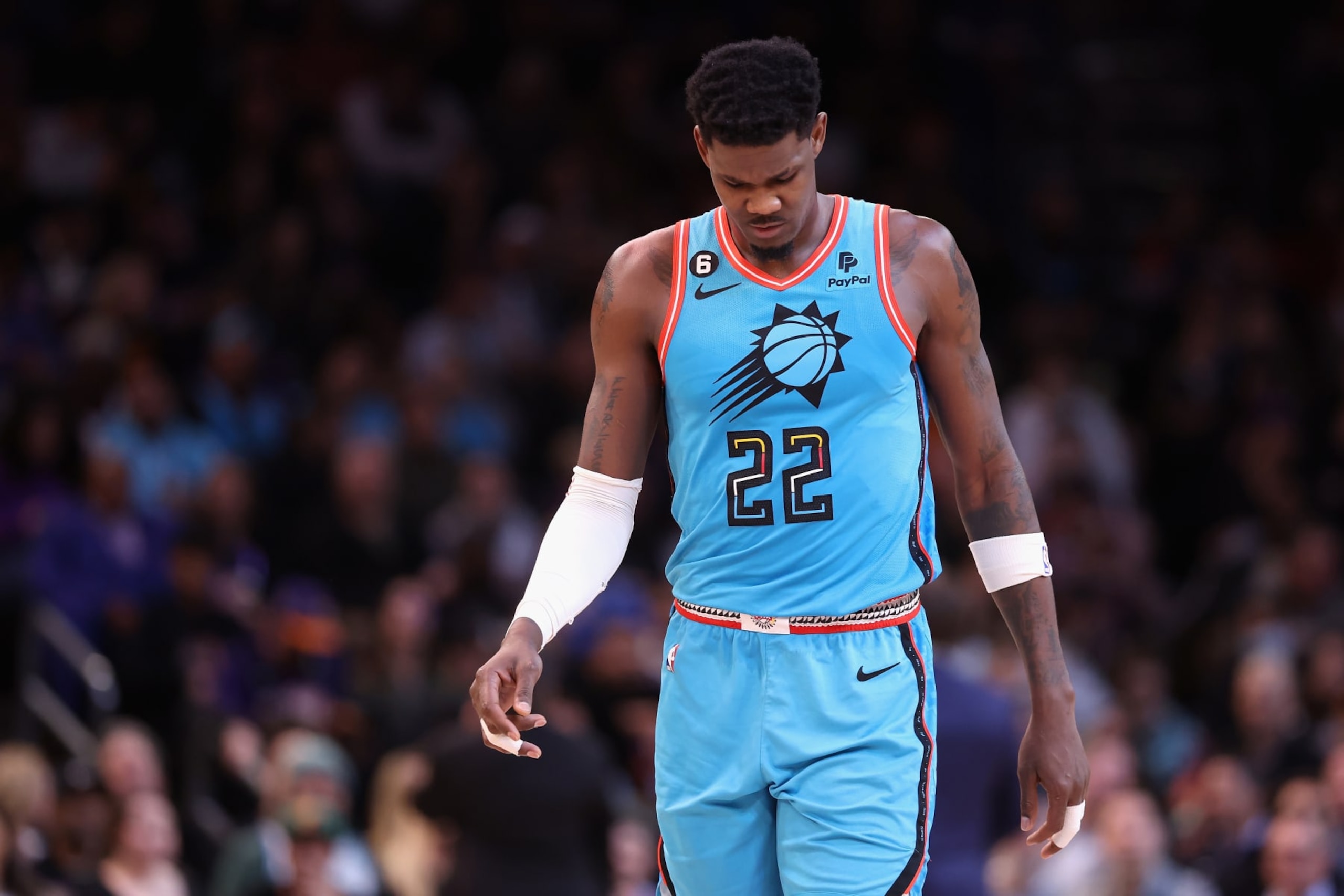 PHOENIX, ARIZONA - JANUARY 26:  Deandre Ayton #22 of the Phoenix Suns reacts during the first half of the NBA game against the Dallas Mavericks at Footprint Center on January 26, 2023 in Phoenix, Arizona. The Mavericks defeated the Suns 99-95. NOTE TO USER: User expressly acknowledges and agrees that, by downloading and or using this photograph, User is consenting to the terms and conditions of the Getty Images License Agreement. (Photo by Christian Petersen/Getty Images)
