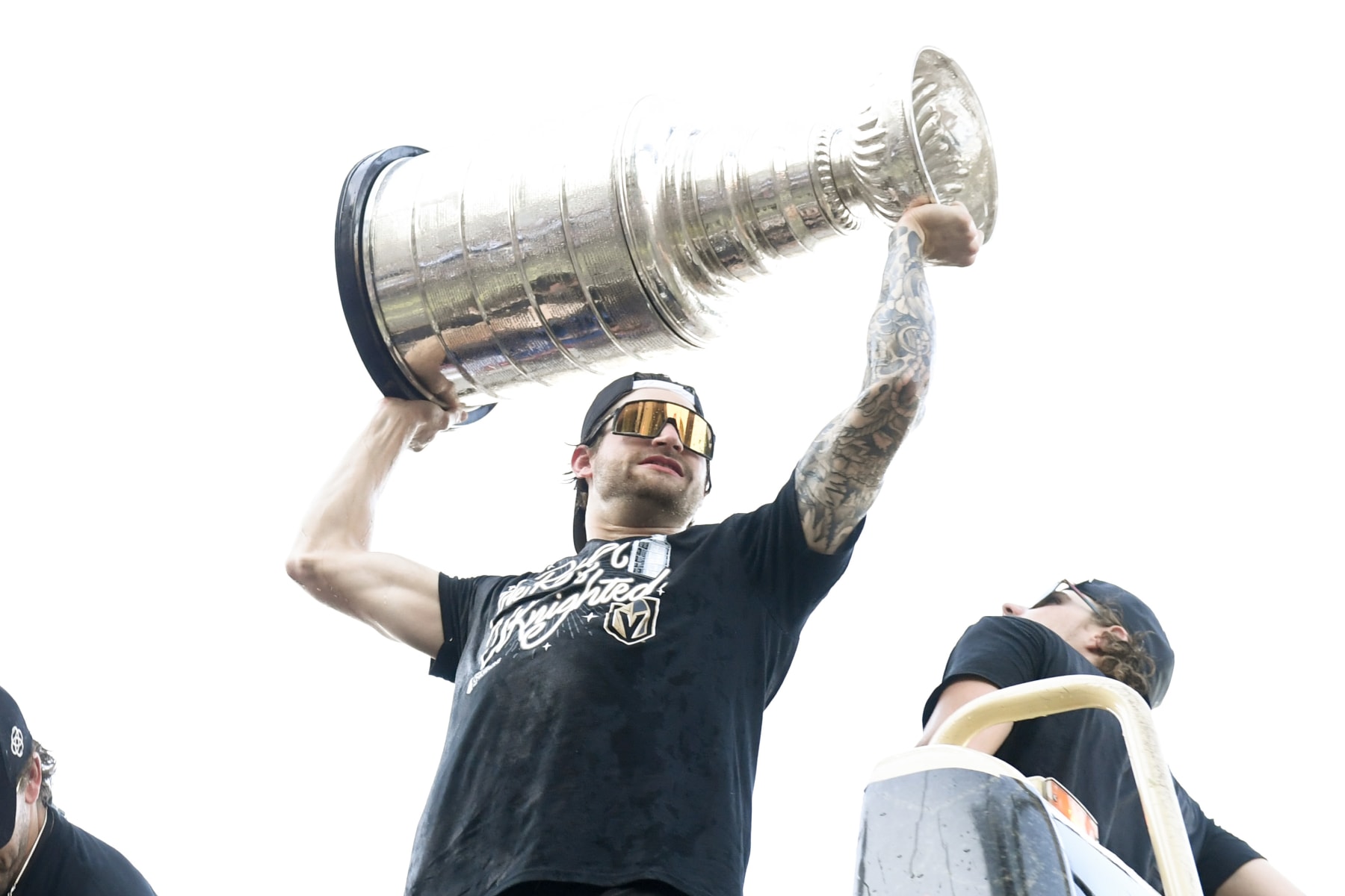 LAS VEGAS, NEVADA - JUNE 17: Adin Hill #33 of the Vegas Golden Knights hoists the Stanley Cup during a victory parade and rally for the Vegas Golden Knights on the Las Vegas Strip on June 17, 2023 in Las Vegas, Nevada. The Golden Knights defeated the Florida Panthers four games to one to win the 2023 NHL Stanley Cup Final. (Photo by Candice Ward/Getty Images)