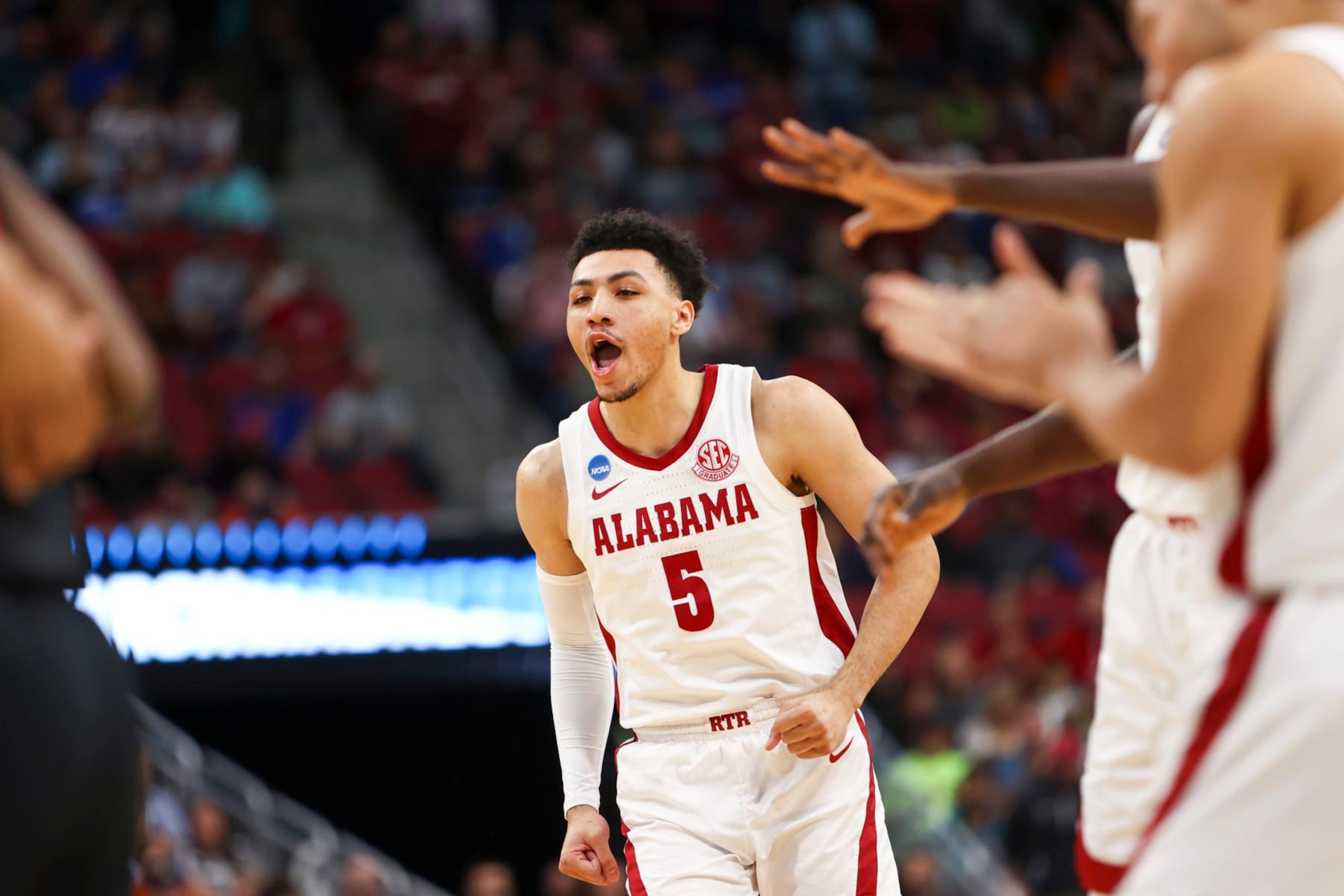 LOUISVILLE, KY - MARCH 24: Jahvon Quinerly #5 of the Alabama Crimson Tide celebrates scoring against the San Diego State Aztecs during the Sweet Sixteen round of the 2022 NCAA Men's Basketball Tournament held at KFC YUM! Center on March 24, 2023 in Louisville, Kentucky. (Photo by Grace Bradley/NCAA Photos via Getty Images)