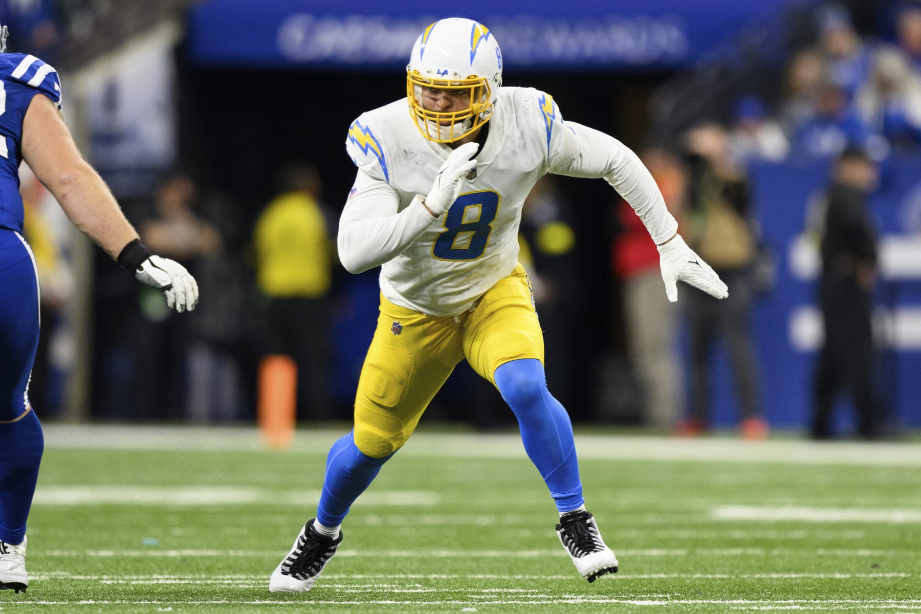 Los Angeles Chargers outside linebacker Kyle Van Noy (8) rushes around the edge during an NFL football game against the Indianapolis Colts, Monday, Dec. 26, 2022, in Indianapolis. (AP Photo/Zach Bolinger)