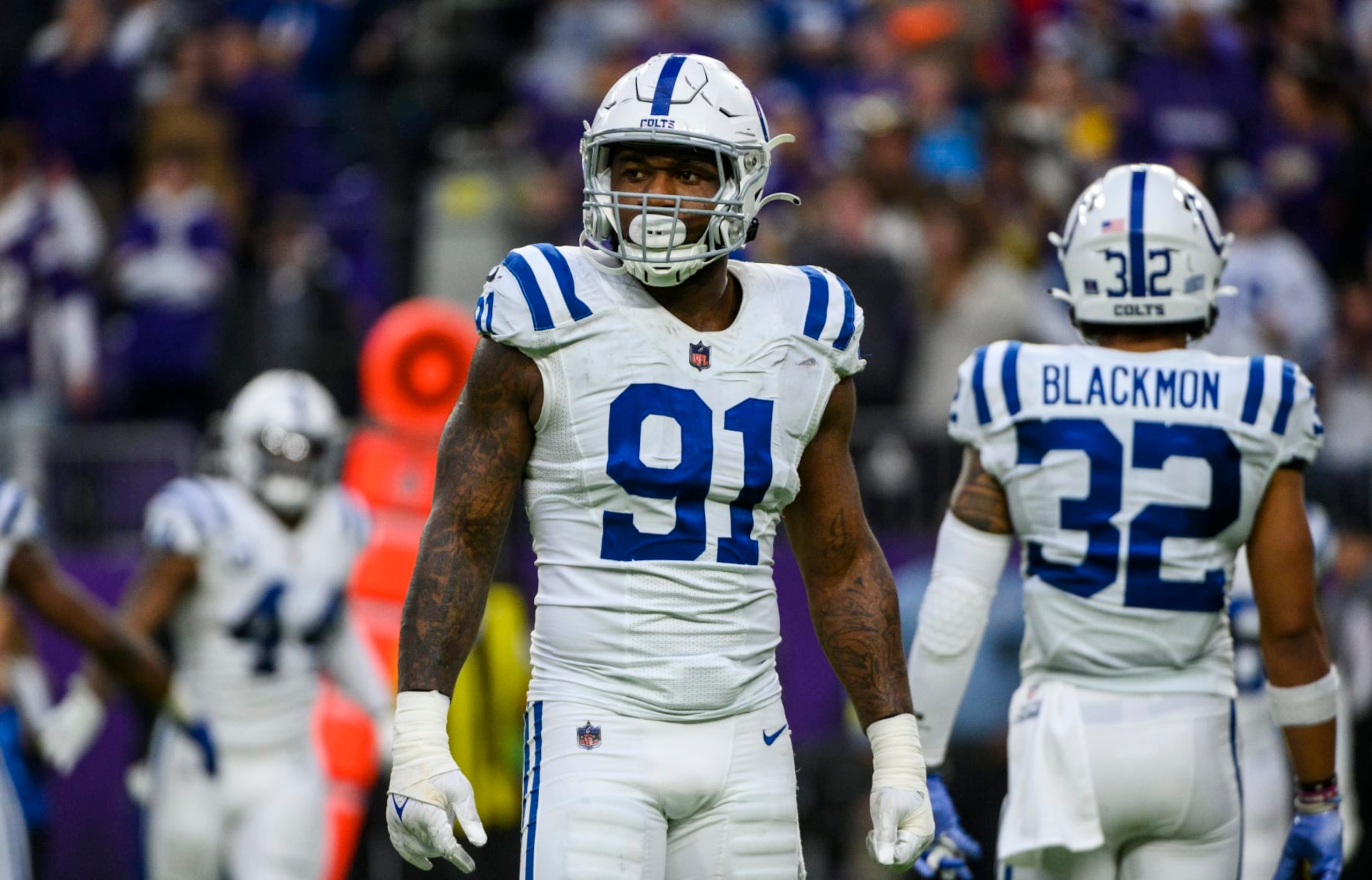 MINNEAPOLIS, MN - DECEMBER 17: Yannick Ngakoue #91 of the Indianapolis Colts stands between plays in the fourth quarter of the game against the Minnesota Vikings at U.S. Bank Stadium on December 17, 2022 in Minneapolis, Minnesota. (Photo by Stephen Maturen/Getty Images)