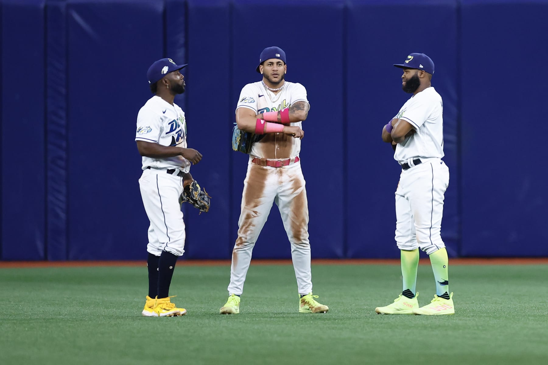 ST PETERSBURG, FLORIDA - JUNE 23: Randy Arozarena #56, Christian Bethancourt #14 and Manuel Margot #13 of the Tampa Bay Rays react after defeating the Kansas City Royals by a score of 11 to 3 at Tropicana Field on June 23, 2023 in St Petersburg, Florida. (Photo by Douglas P. DeFelice/Getty Images)
