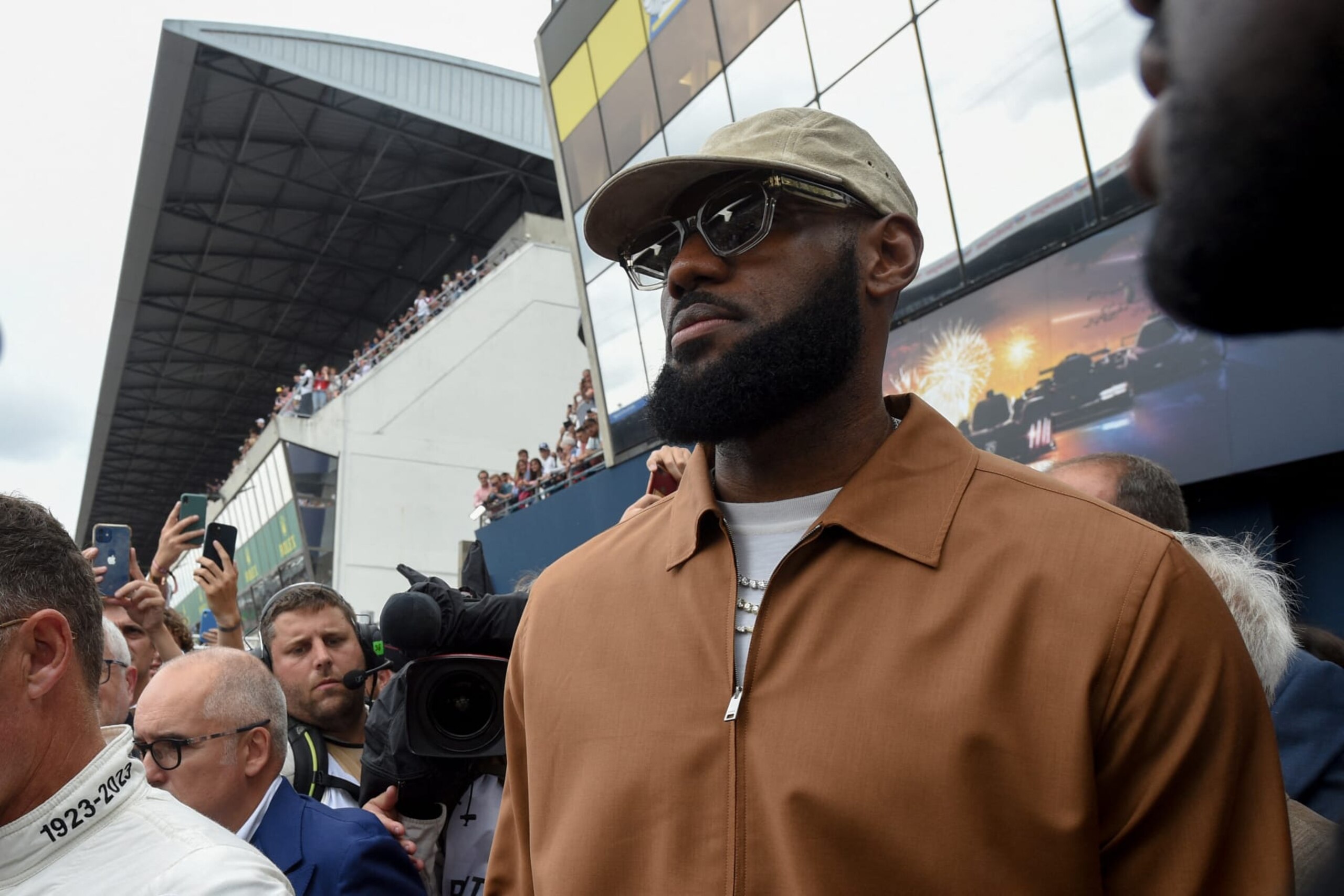 Los Angeles Lakers US NBA basketball player LeBron James walks in the pitlane prior to starting the 100th edition of the 24 hours of Le Mans, on June 10, 2023. This year marks the 100th anniversary of the race. (Photo by Jean-Francois MONIER / AFP) (Photo by JEAN-FRANCOIS MONIER/AFP via Getty Images)