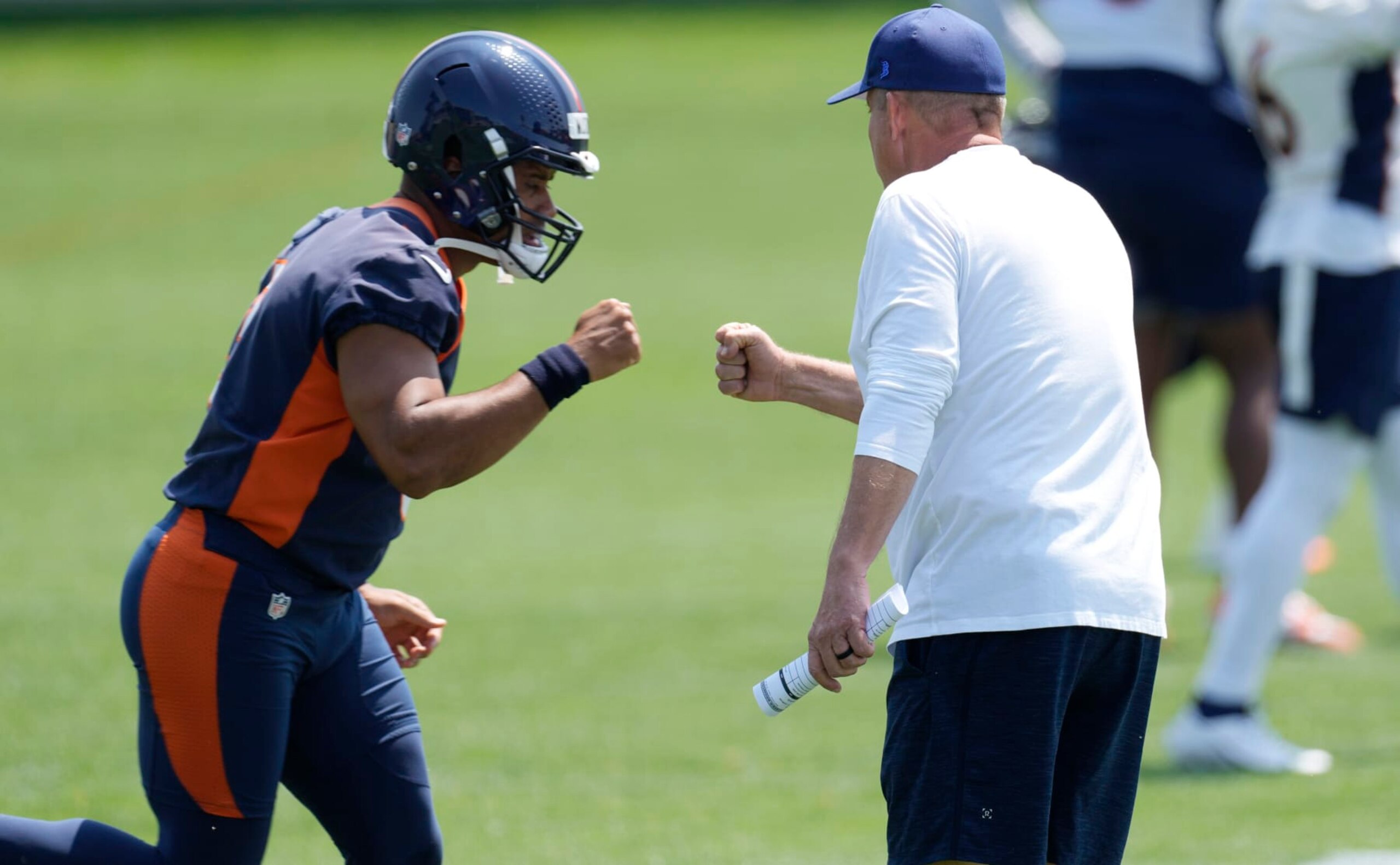 Russell Wilson (left) and Sean Payton.