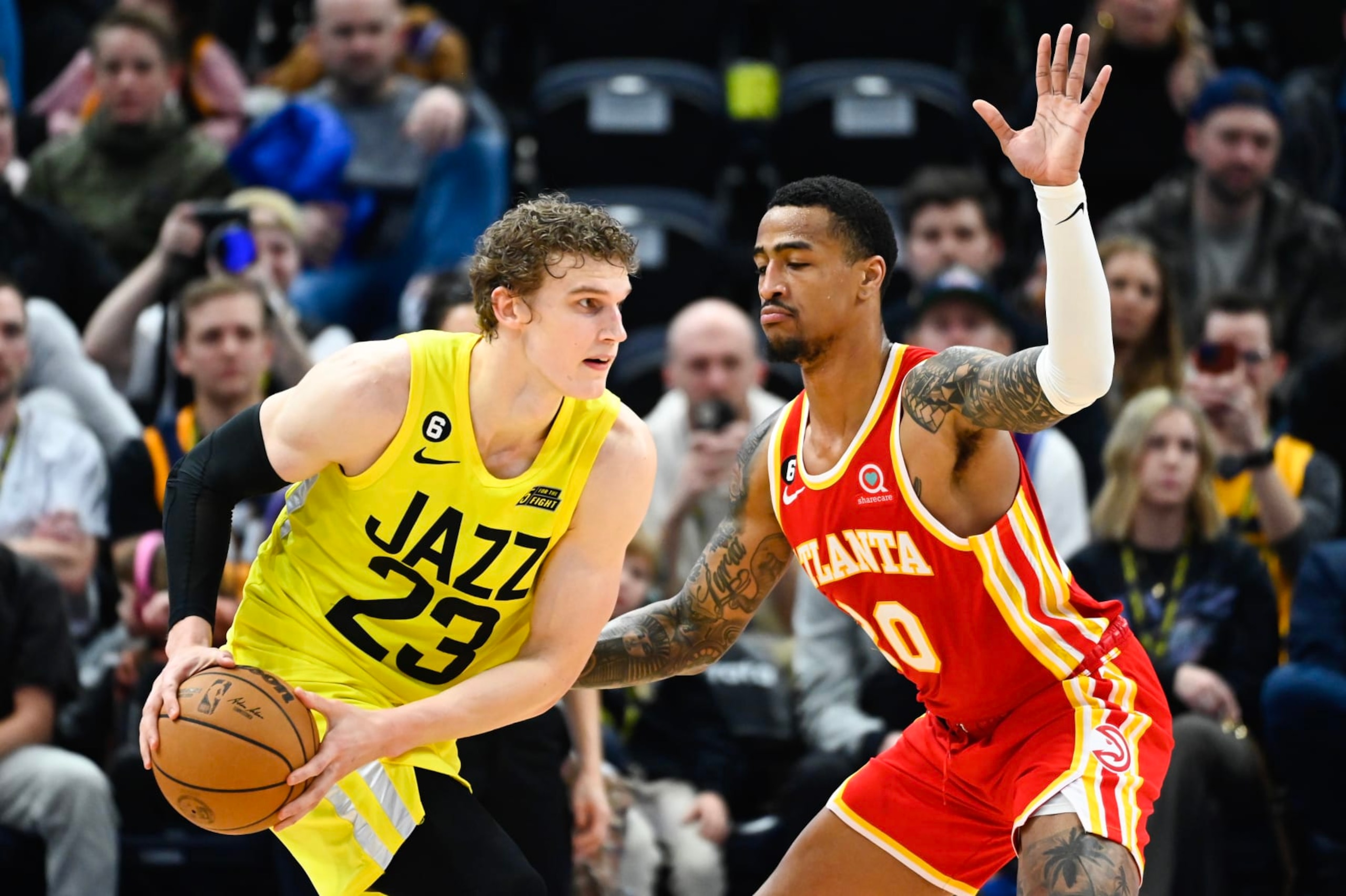 Lauri Markkanen and John Collins