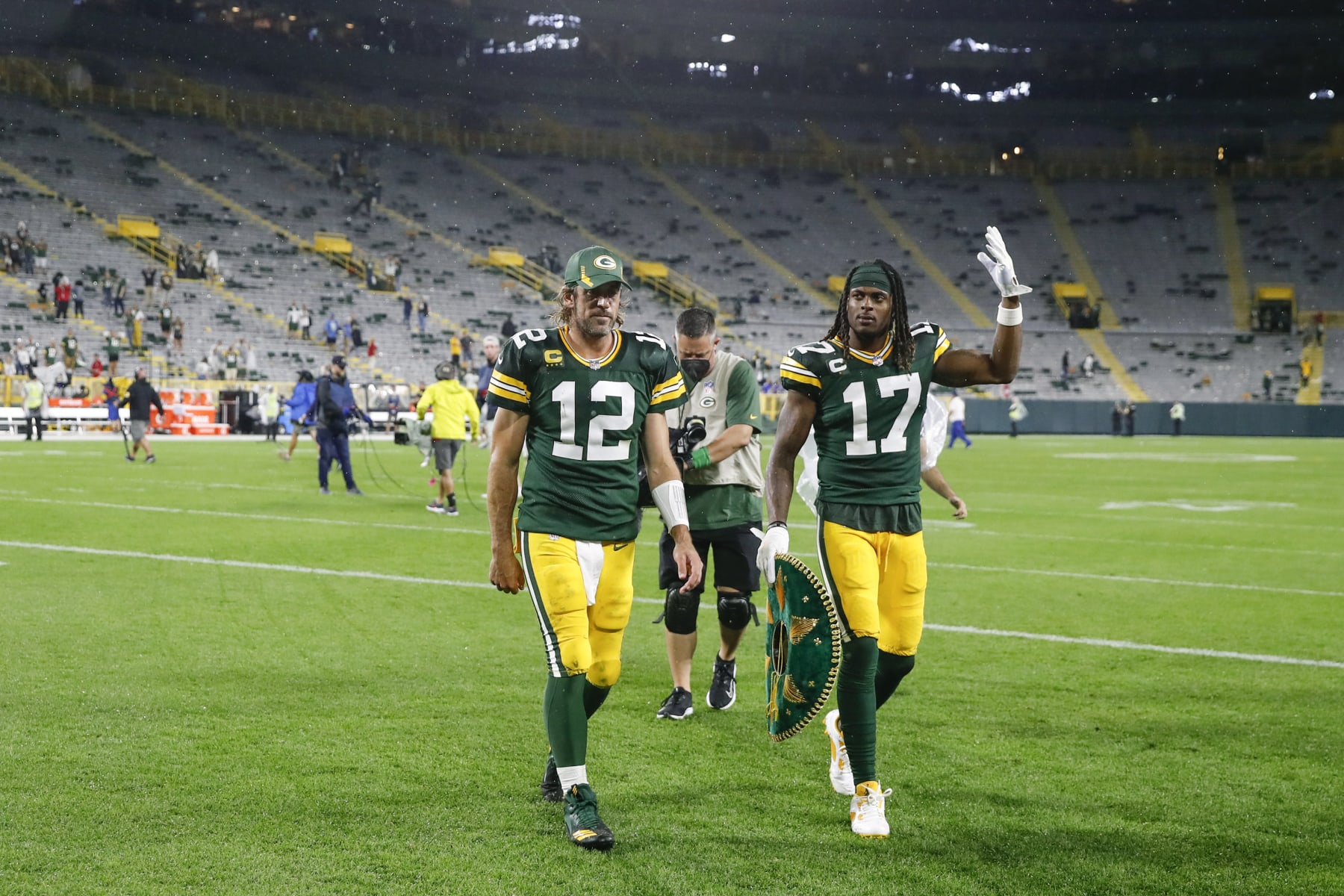 Green Bay Packers quarterback Aaron Rodgers (12) and wide receiver Davante Adams (17) walk off the field after an NFL football game against the Detroit Lions, Monday, Sept. 20, 2021, in Green Bay, Wis. (AP Photo/Kamil Krzaczynski)