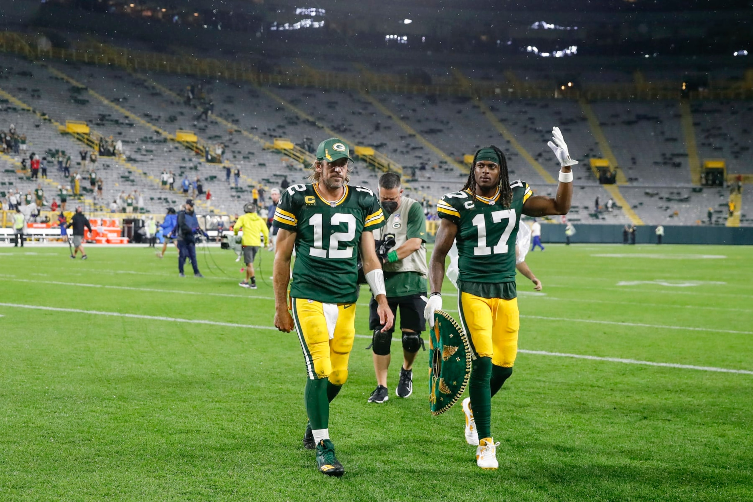 Green Bay Packers quarterback Aaron Rodgers (12) and wide receiver Davante Adams (17) walk off the field after an NFL football game against the Detroit Lions, Monday, Sept. 20, 2021, in Green Bay, Wis. (AP Photo/Kamil Krzaczynski)